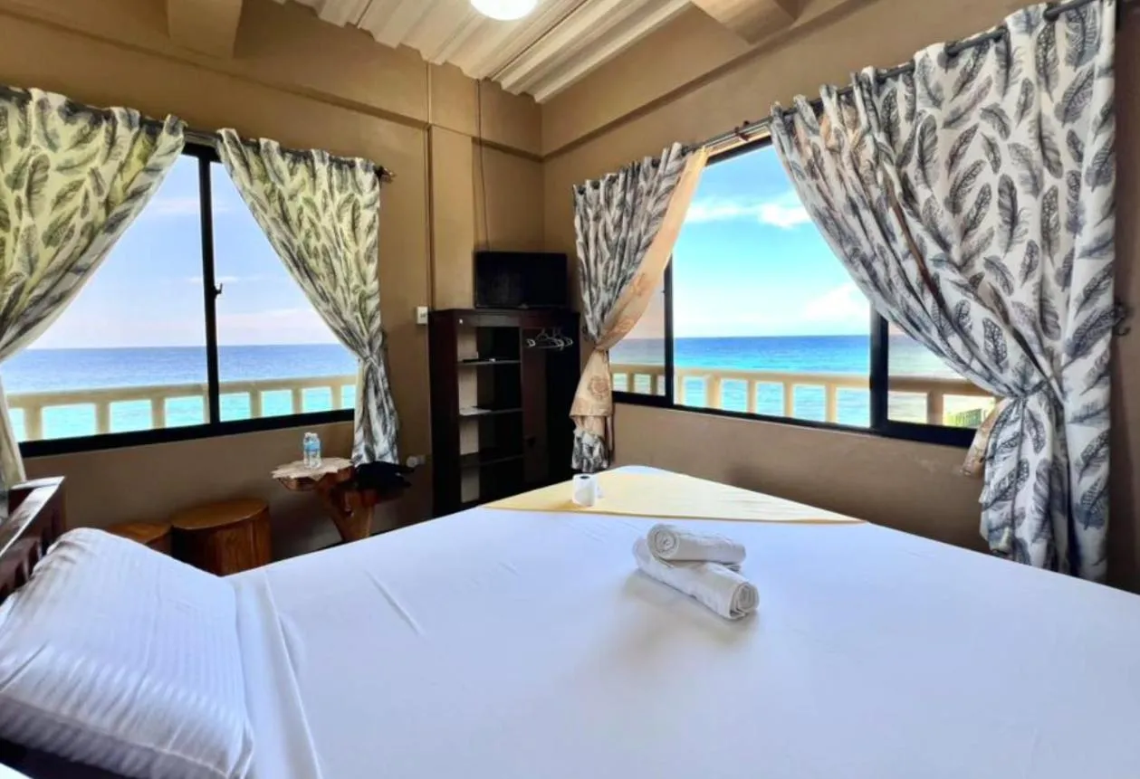 Bed in Oceanfront Beach Resort