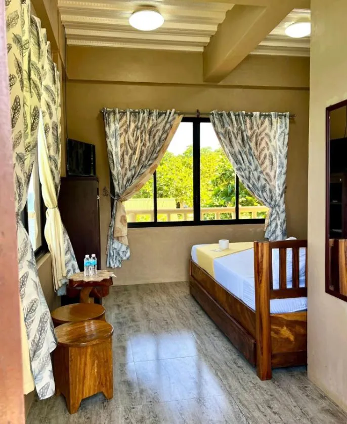 Bed in Oceanfront Beach Resort