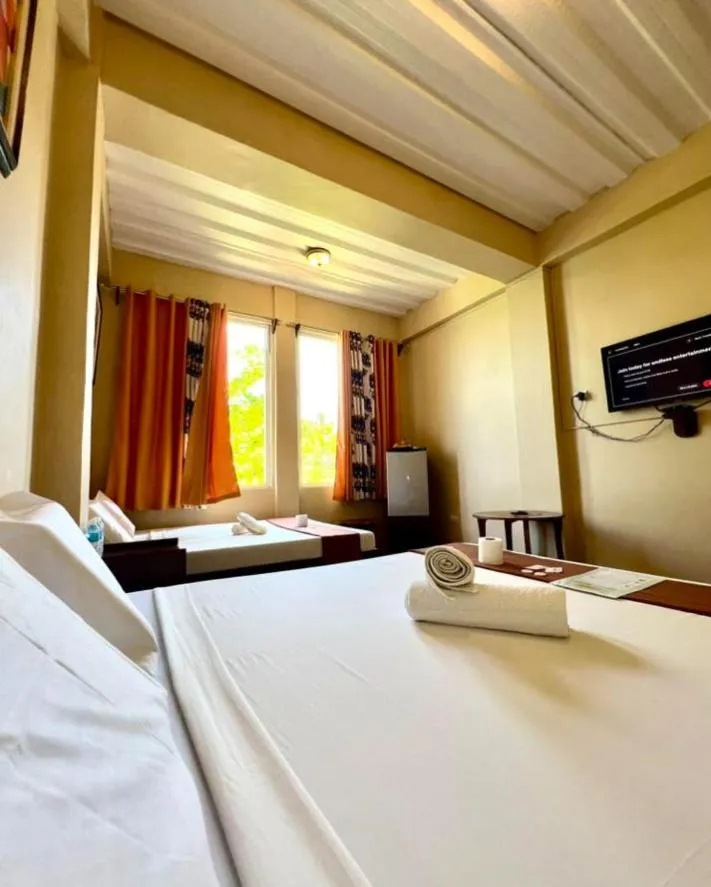 Bed in Oceanfront Beach Resort