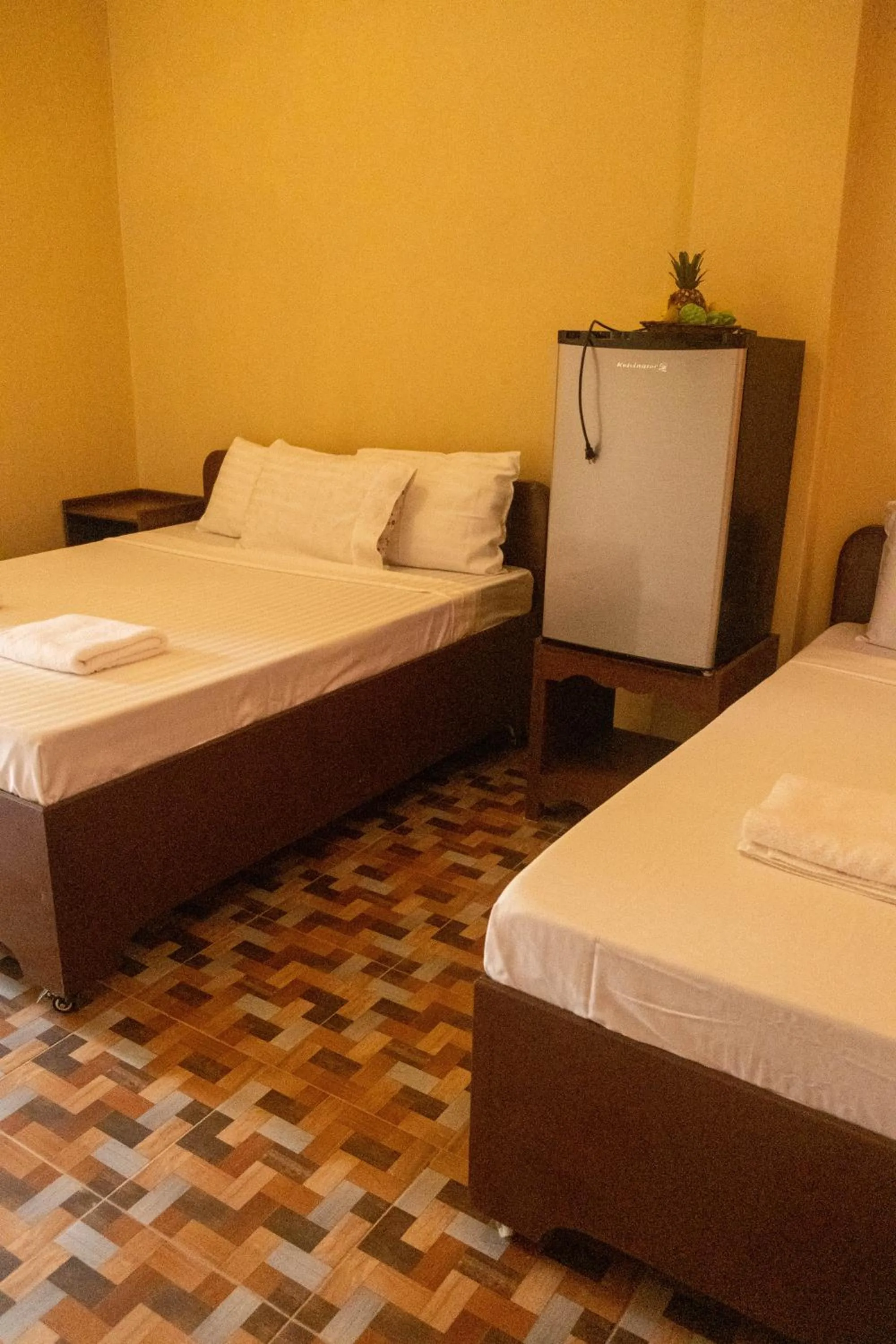 Bed in Oceanfront Beach Resort