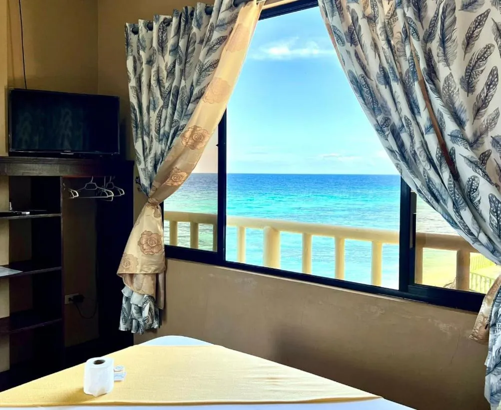 Bed in Oceanfront Beach Resort