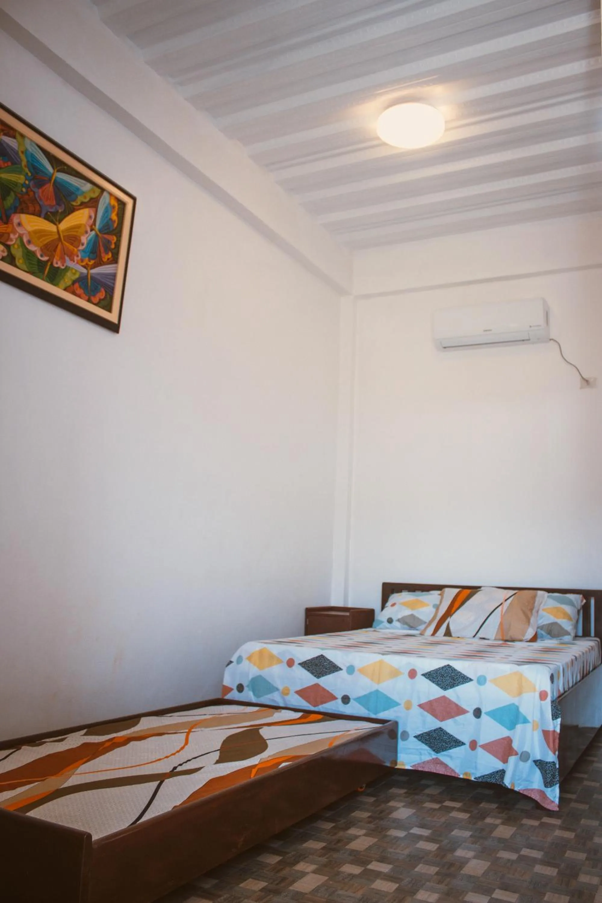 Bed in Oceanfront Beach Resort