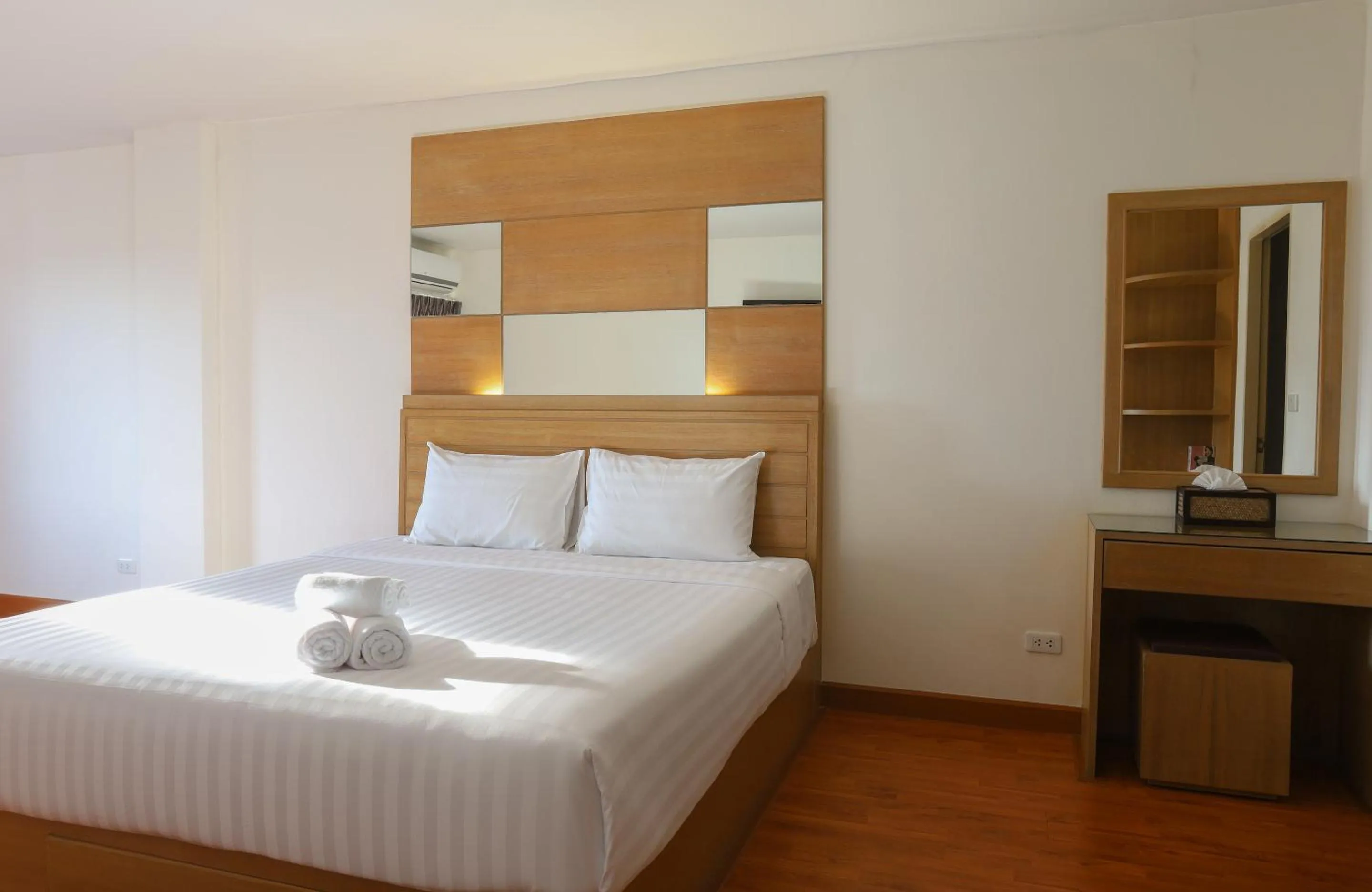 Bed in The Greenery central suite & hotel