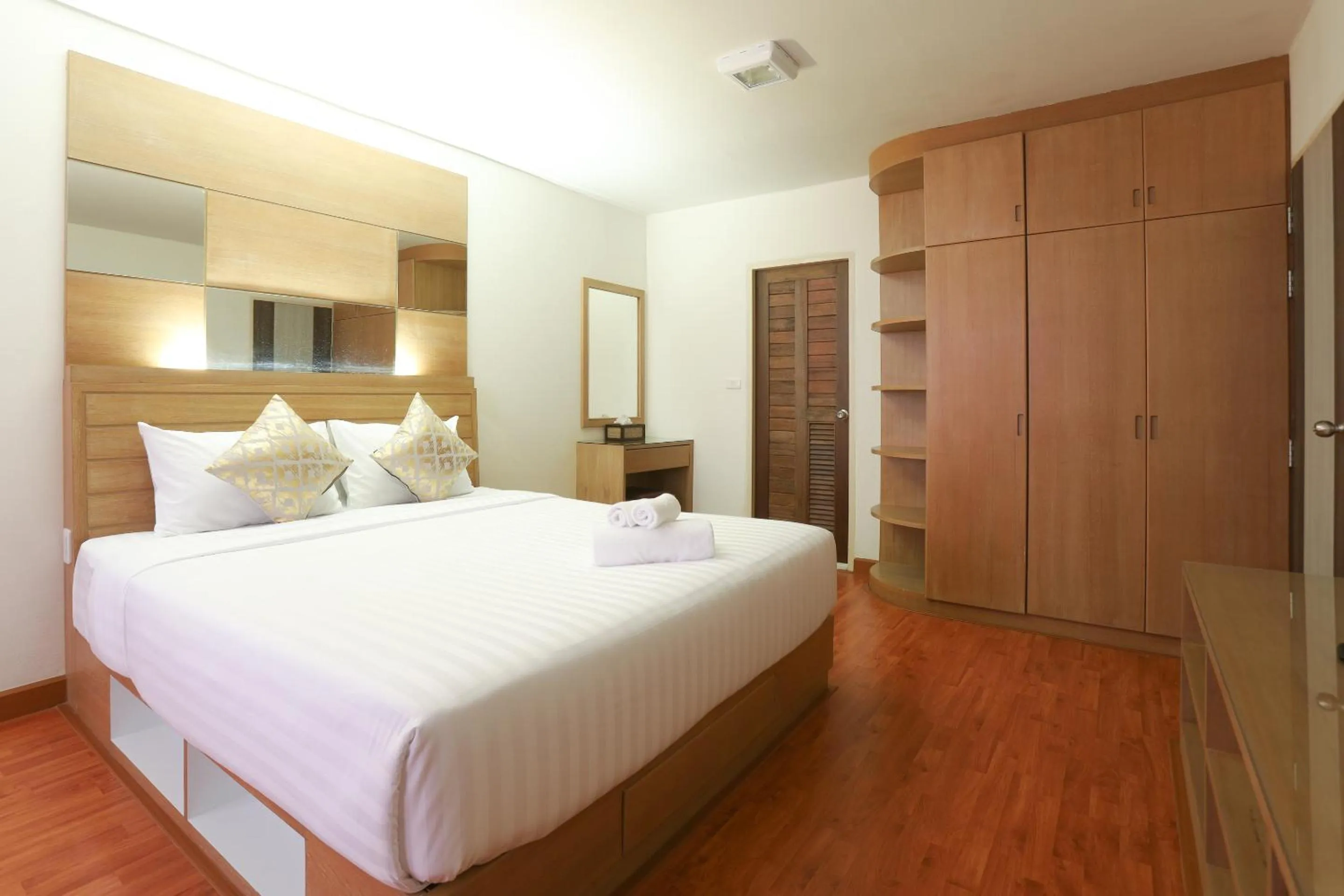 Bed in The Greenery central suite & hotel