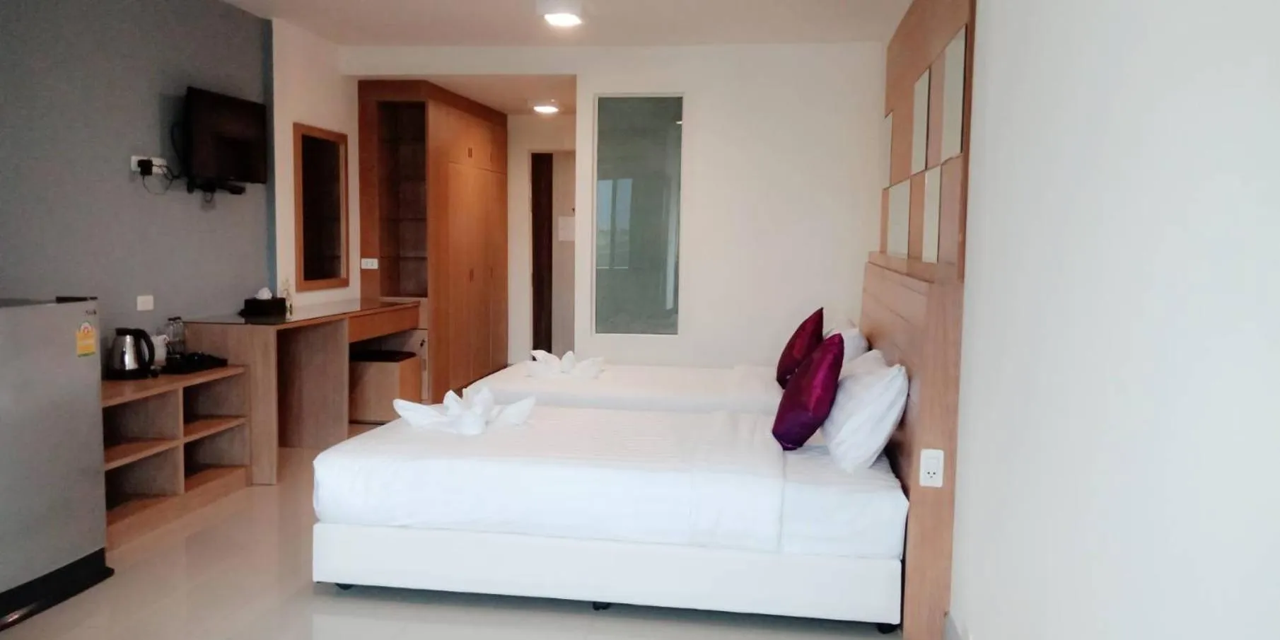 Bed in The Greenery central suite & hotel