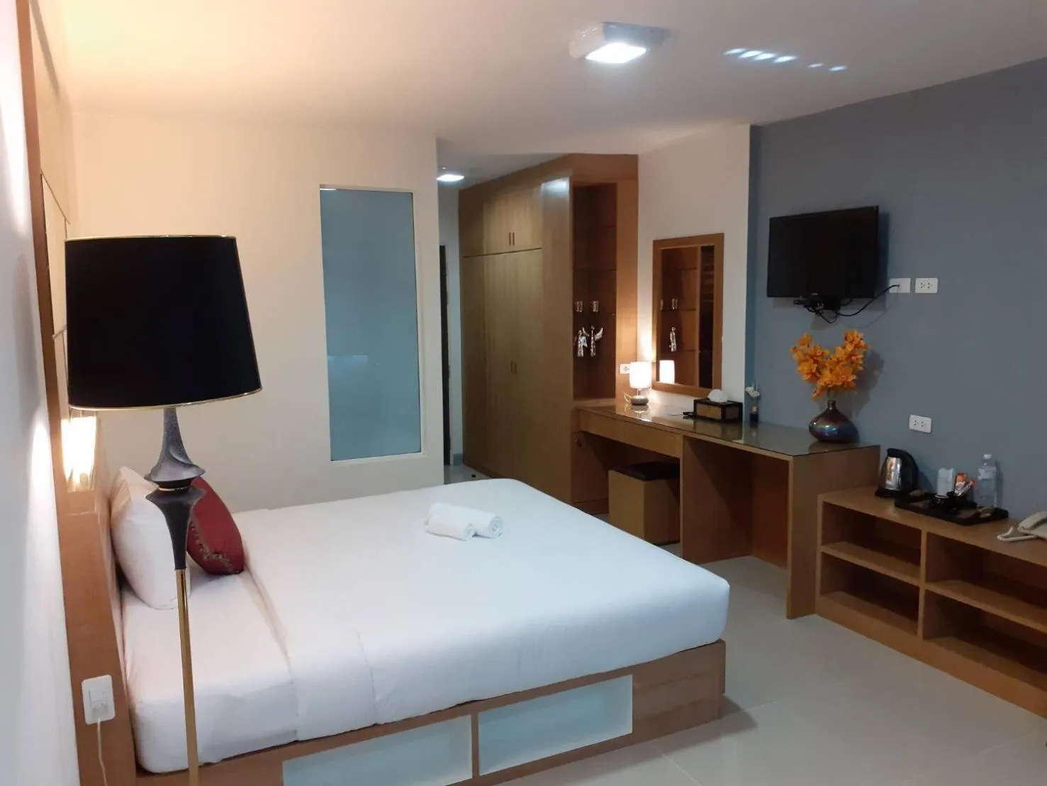 Bed in The Greenery central suite & hotel