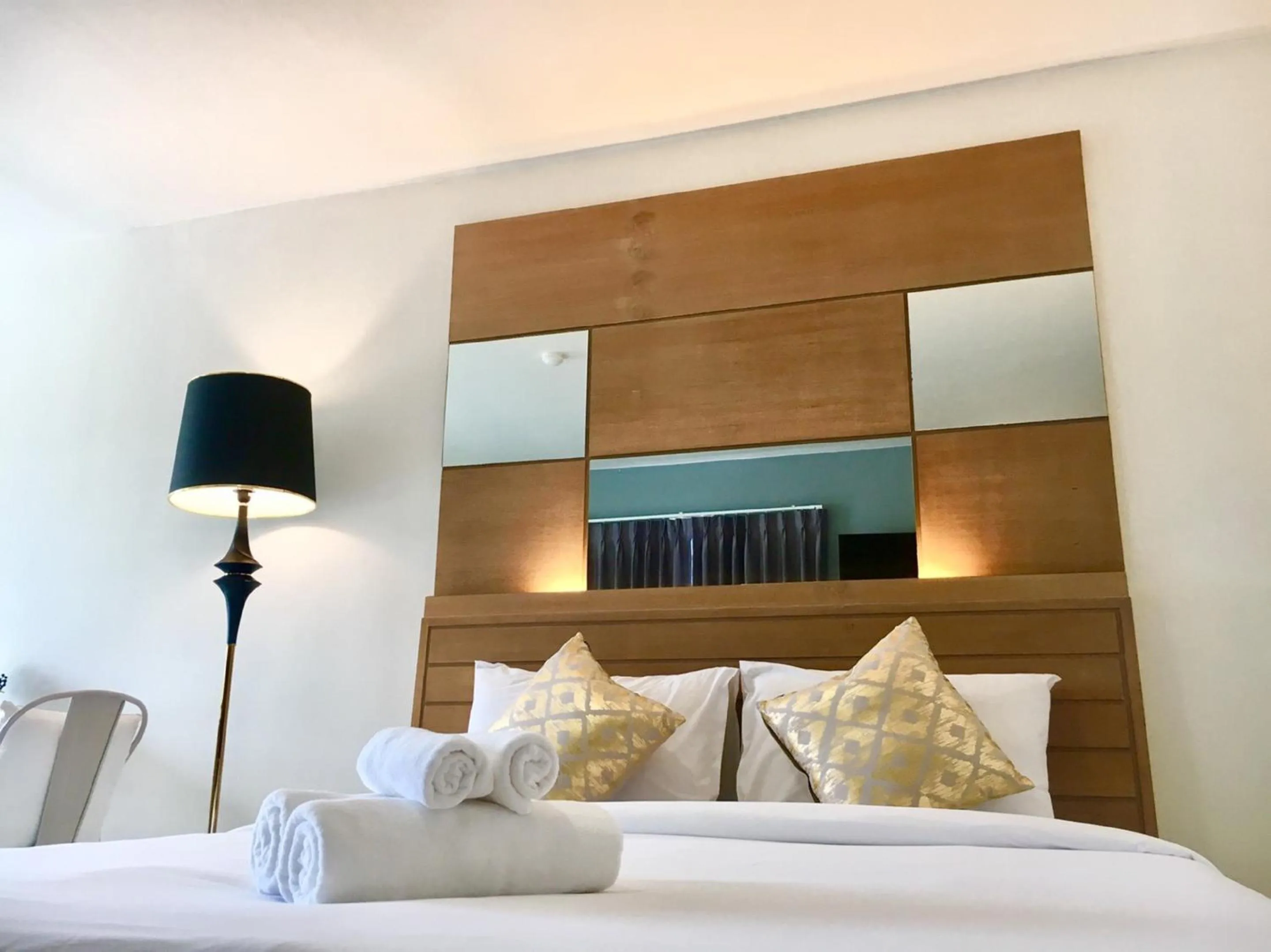 Bed in The Greenery central suite & hotel