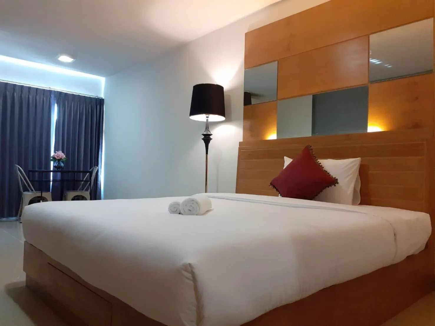 Bed in The Greenery central suite & hotel