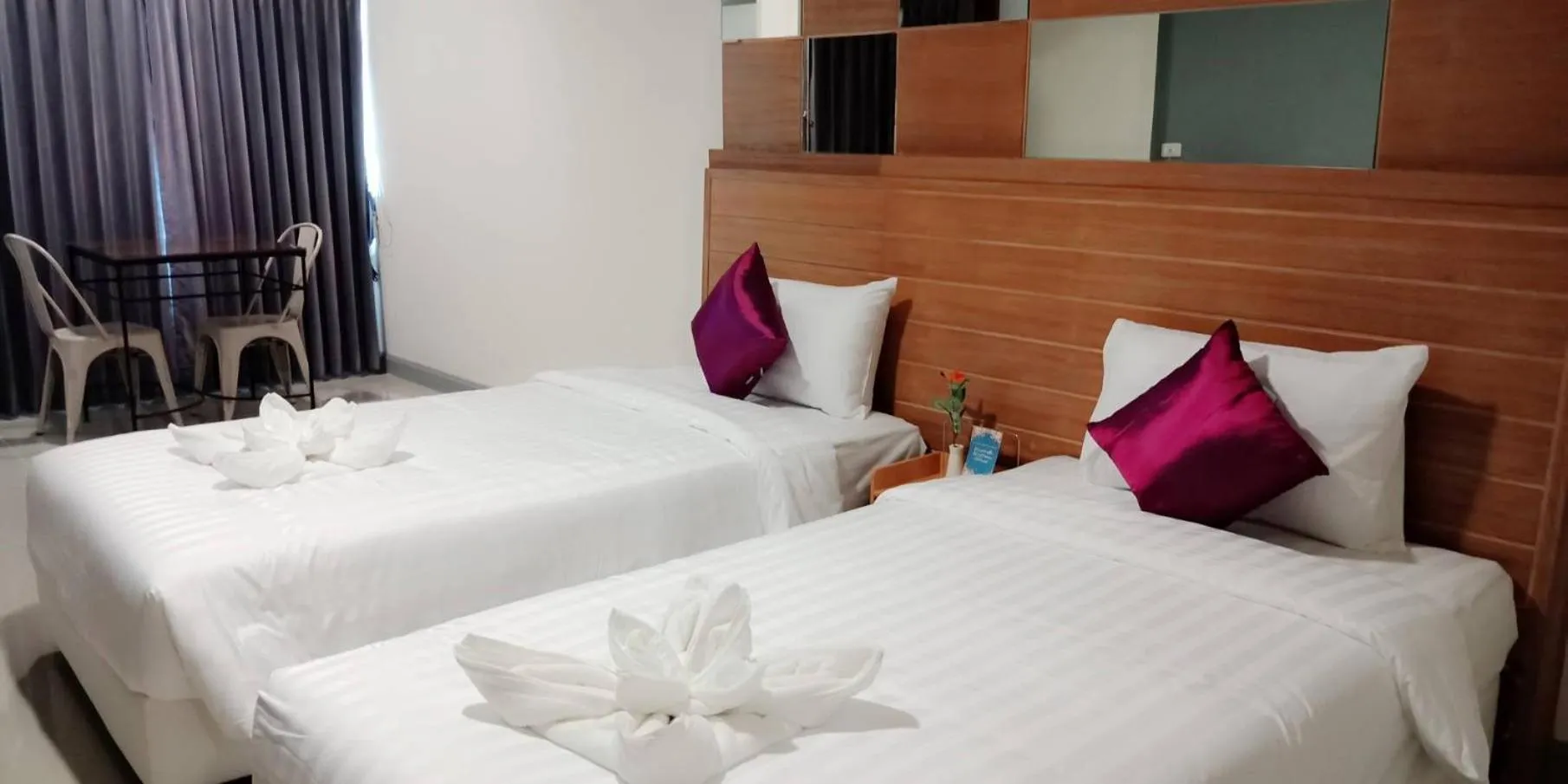 Bed in The Greenery central suite & hotel