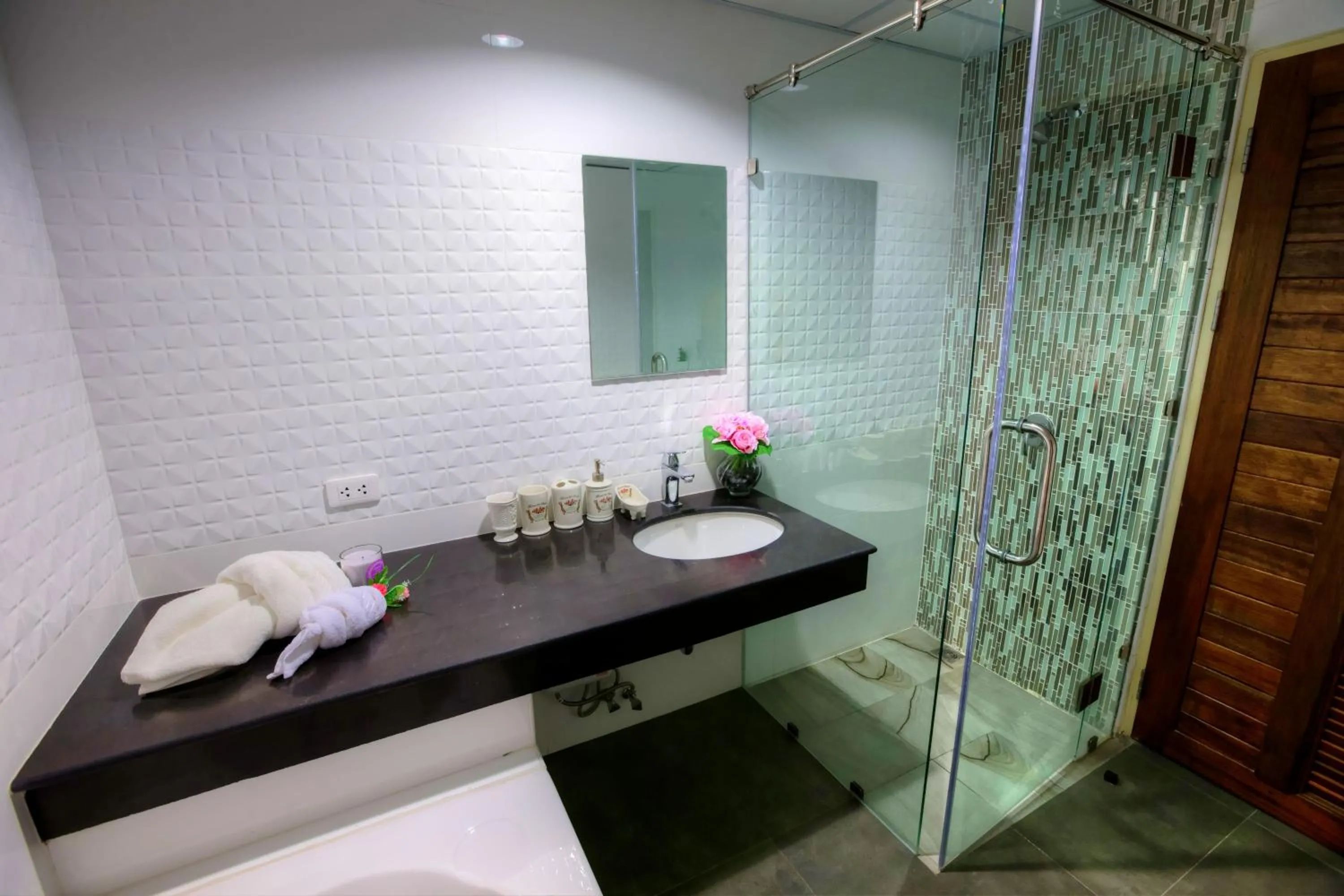 Shower in The Greenery central suite & hotel