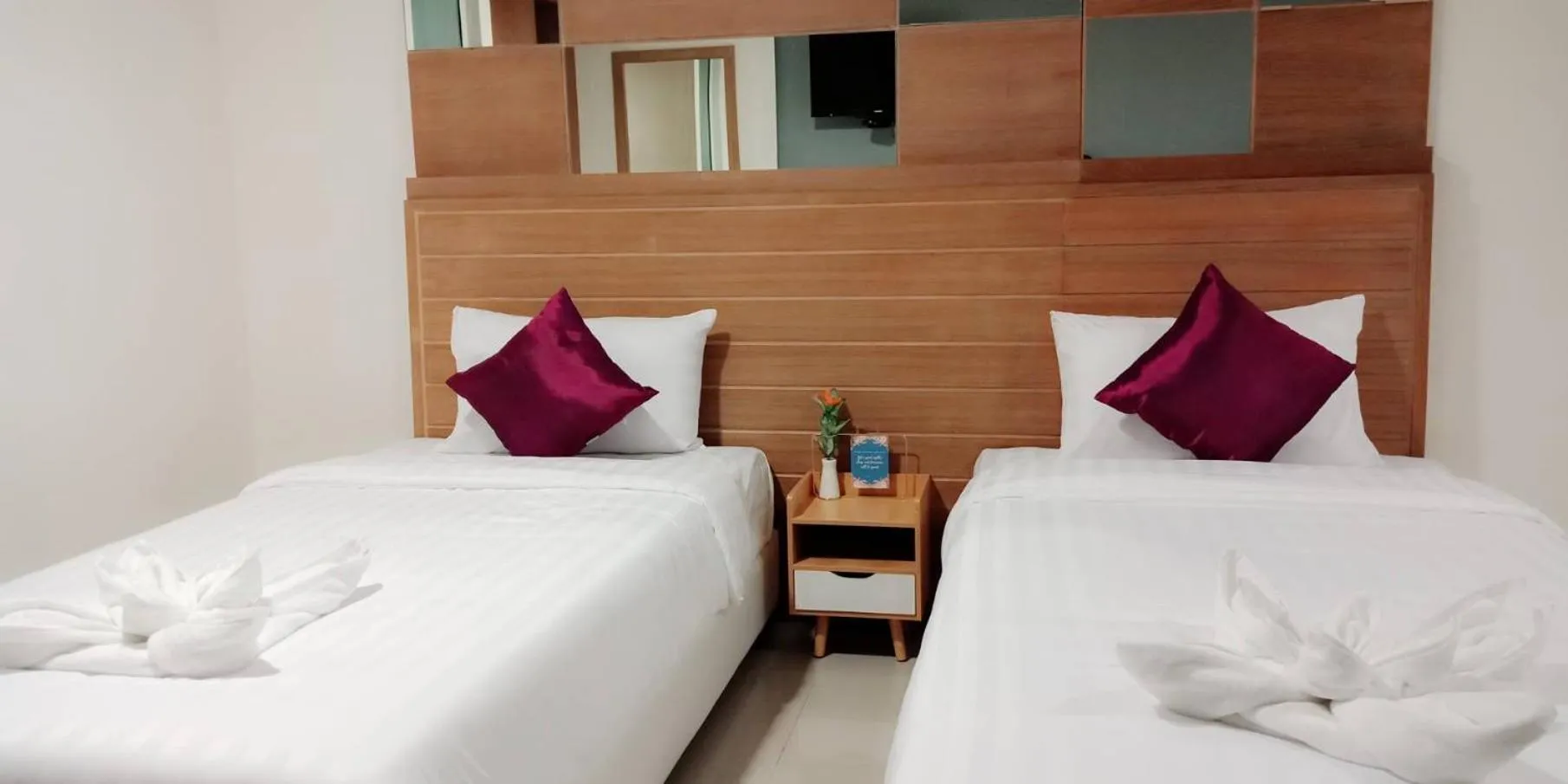 Bed in The Greenery central suite & hotel