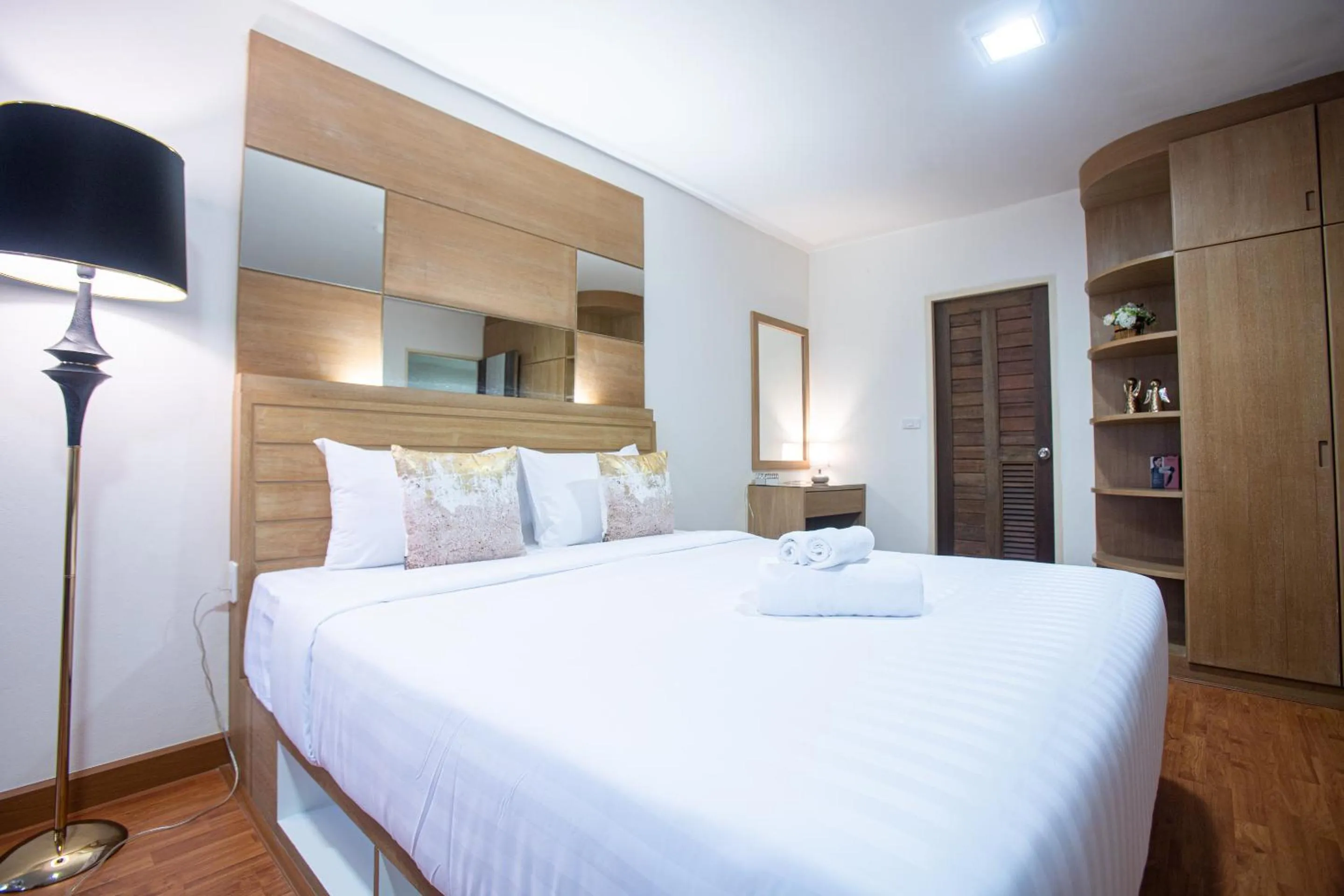 Bed in The Greenery central suite & hotel