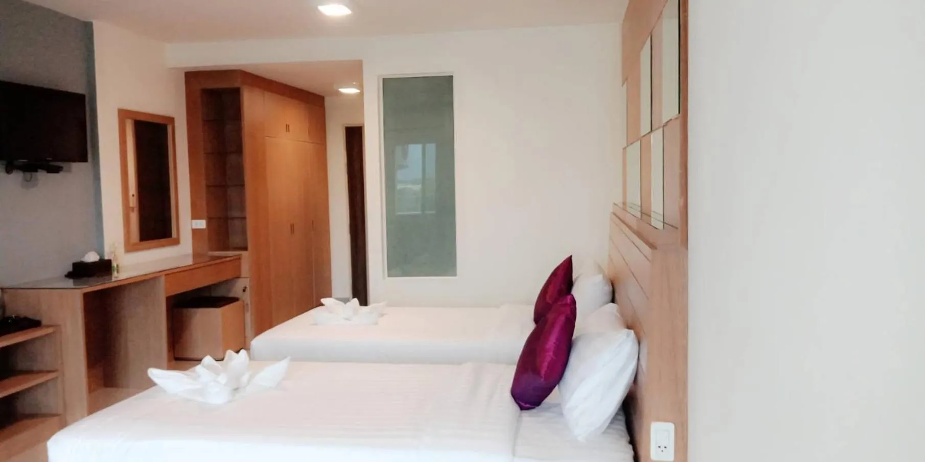 Bed in The Greenery central suite & hotel