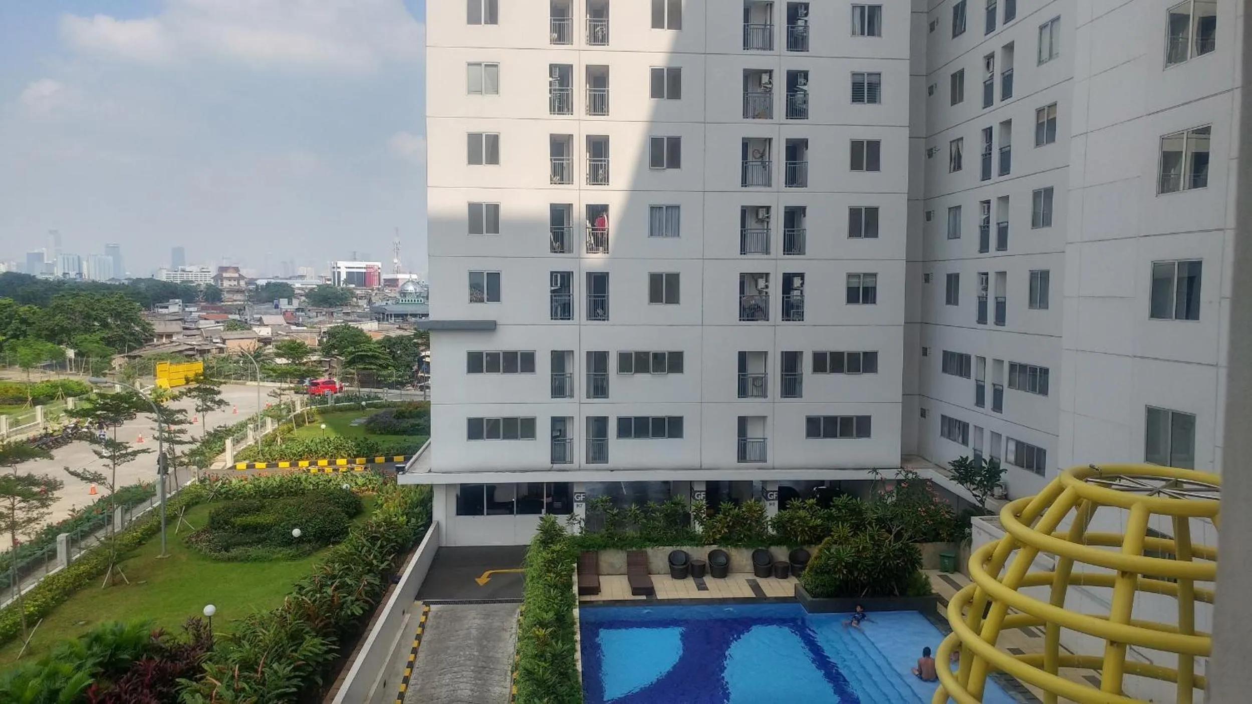 Property building in Modern and Comfort 2BR Bassura City Apartment By Travelio