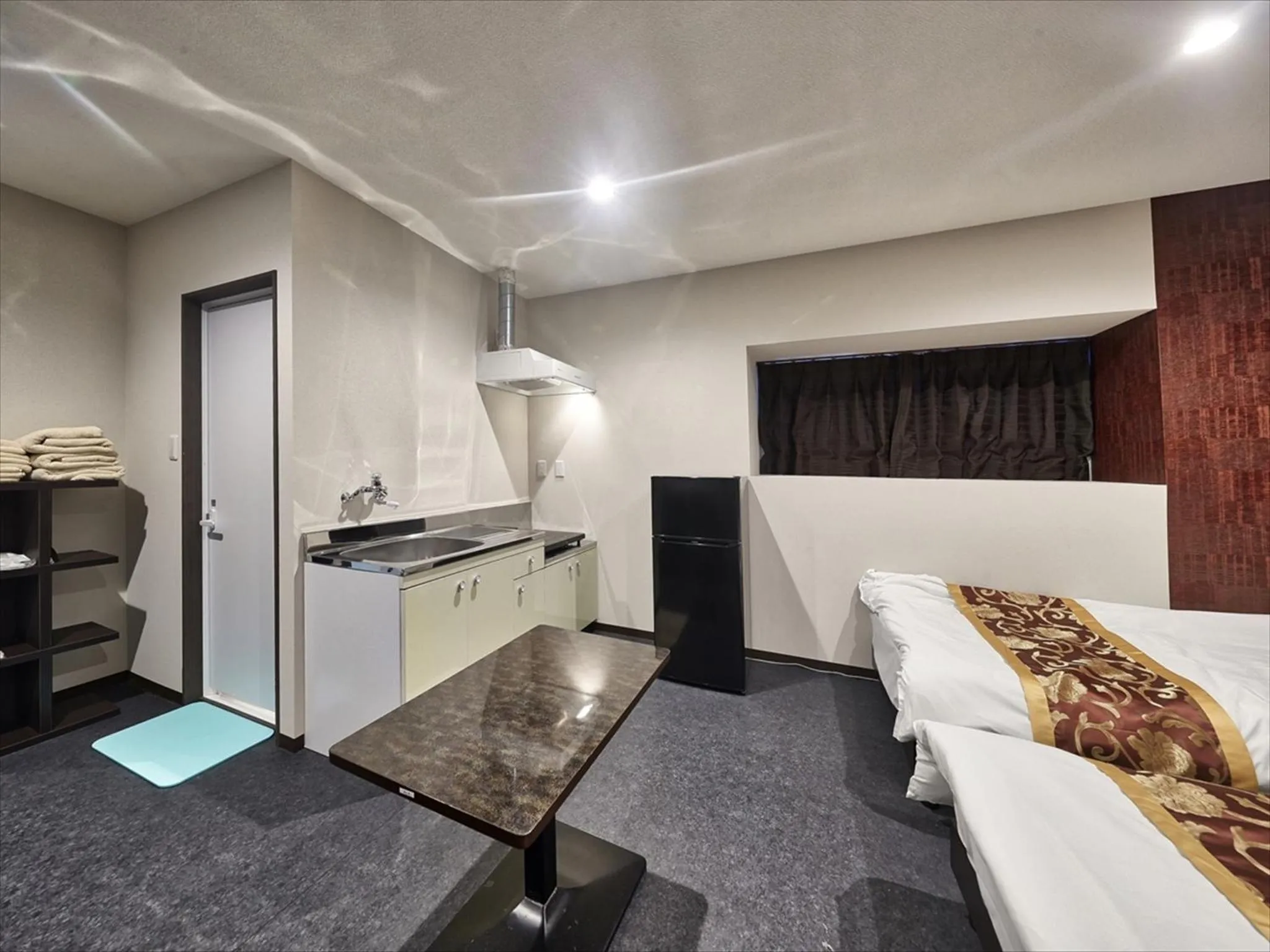 Kitchen or kitchenette, Bed in Okinawa City Hotel