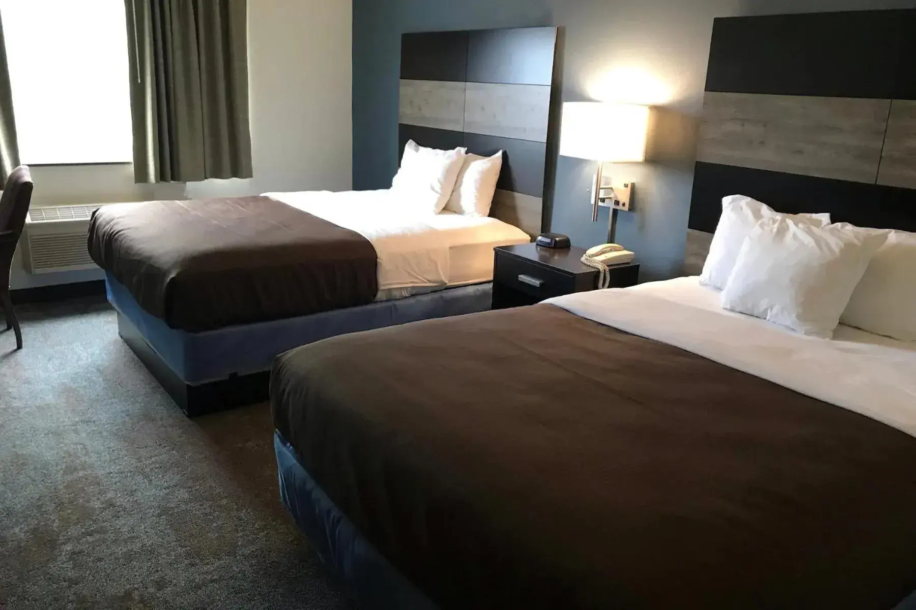 Guests, Bed in AmericInn by Wyndham Maquoketa Guests, Bed in AmericInn by Wyndham Maquoketa