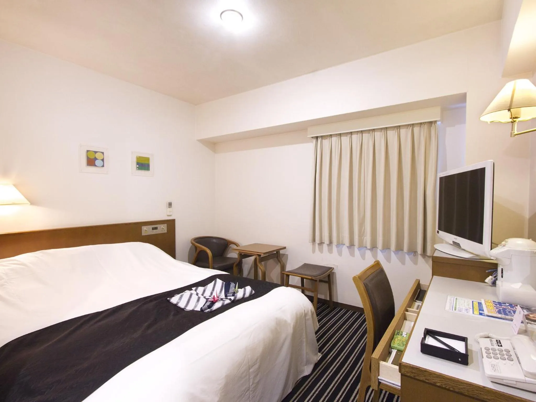 Photo of the whole room, Bed in APA Hotel Mito-eki Kita