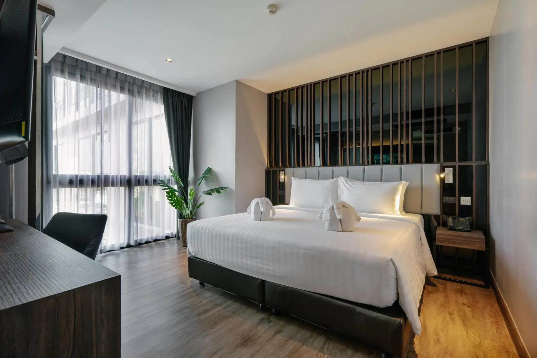 Bed in Rak Elegant Hotel Patong Bed in Rak Elegant Hotel Patong