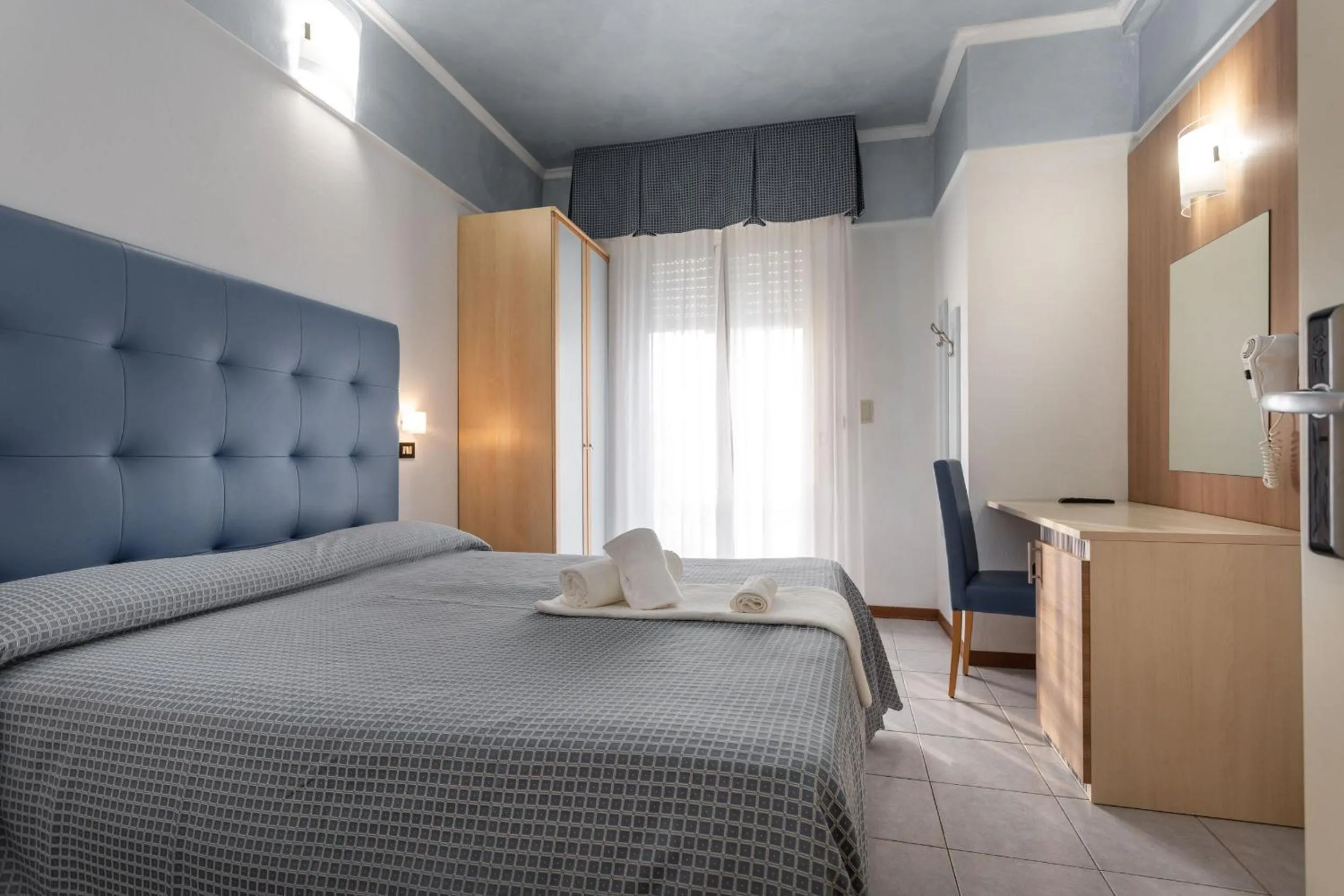 Bed in Hotel Nettuno