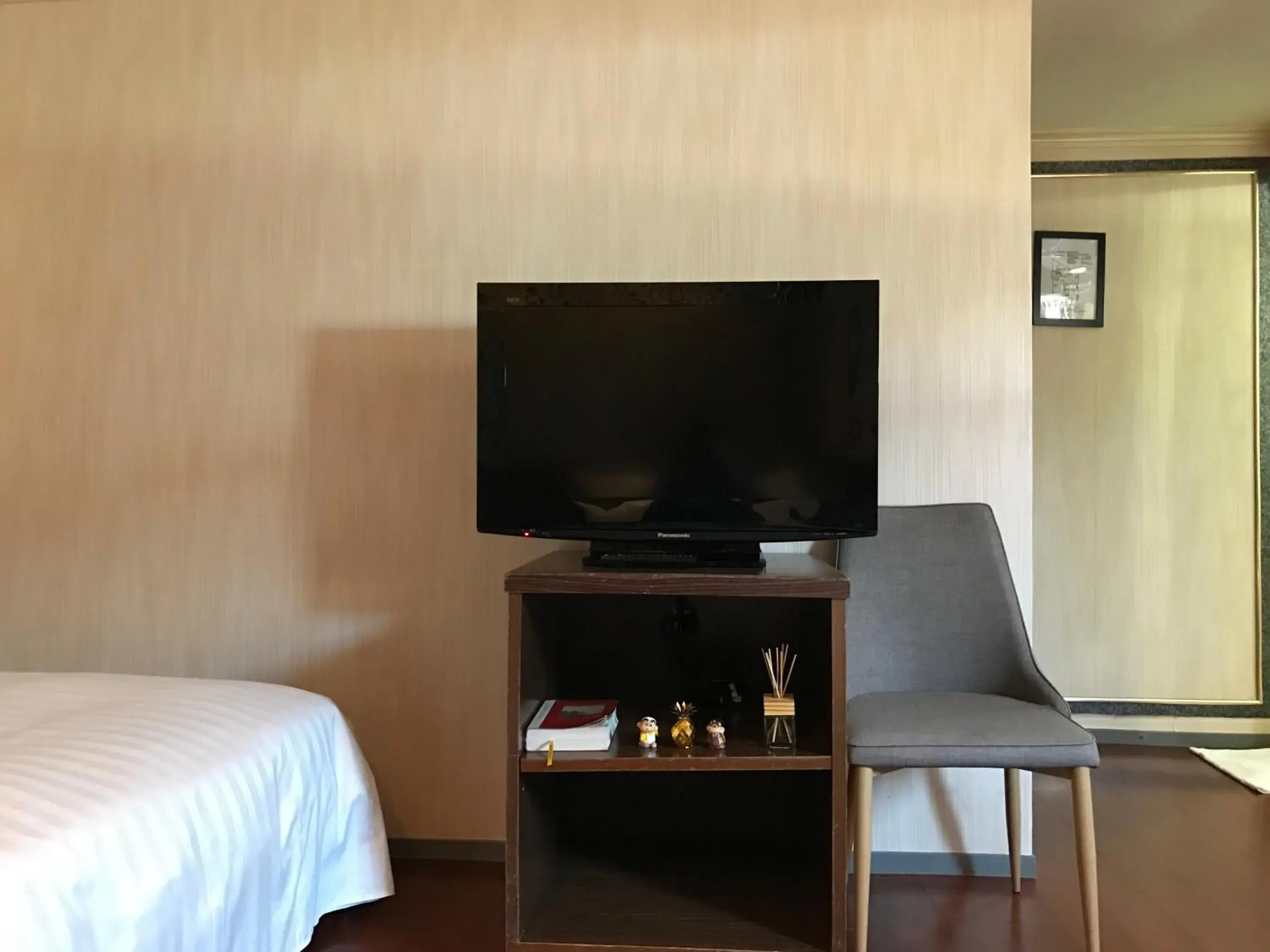 Communal lounge/ TV room, Bed in Fu Chang Hotel Communal lounge/ TV room, Bed in Fu Chang Hotel