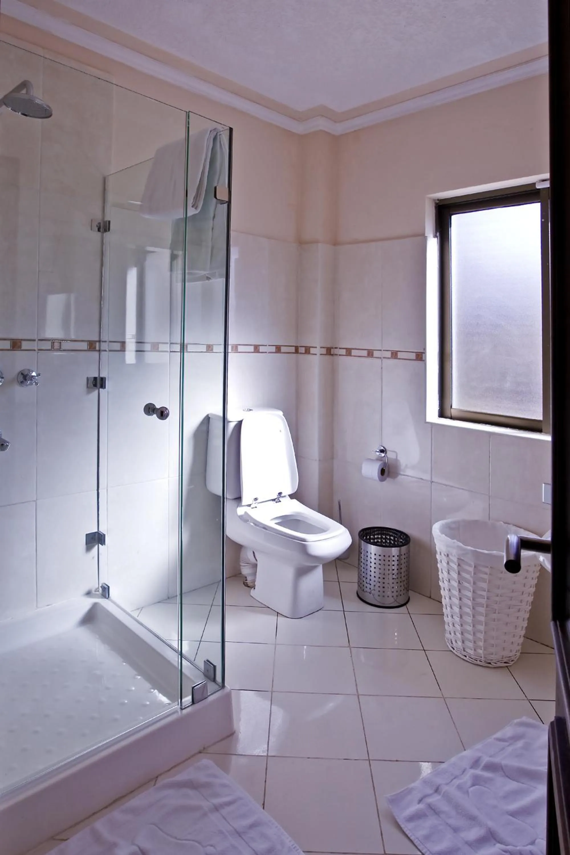 Shower in GemSuites Serviced Apartments State House