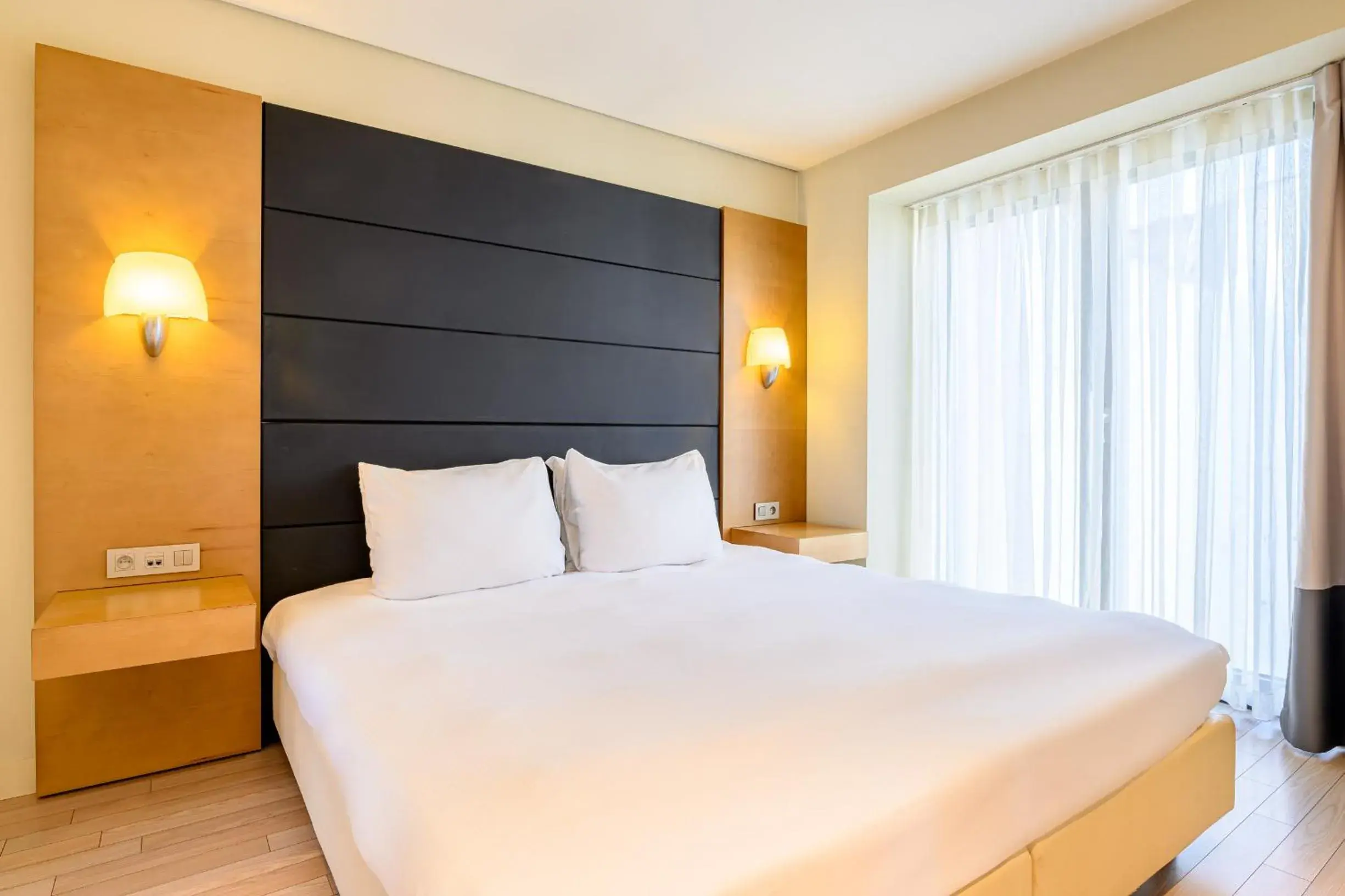 Bed in B-aparthotel Grand Place Bed in B-aparthotel Grand Place