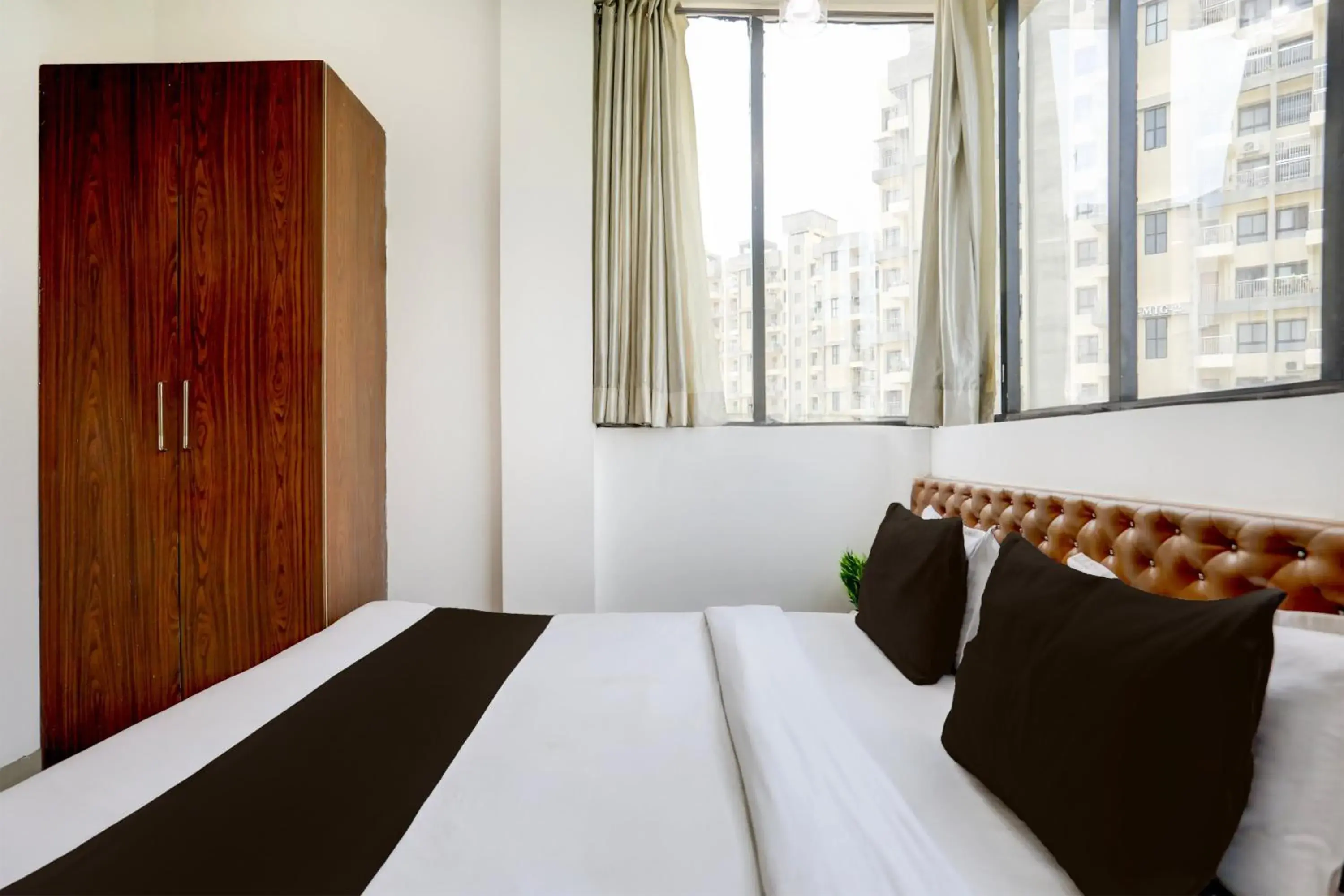 Bedroom, Bed in Super Hotel O MP Nagar Near Rachna Tower Bedroom, Bed in Super Hotel O MP Nagar Near Rachna Tower