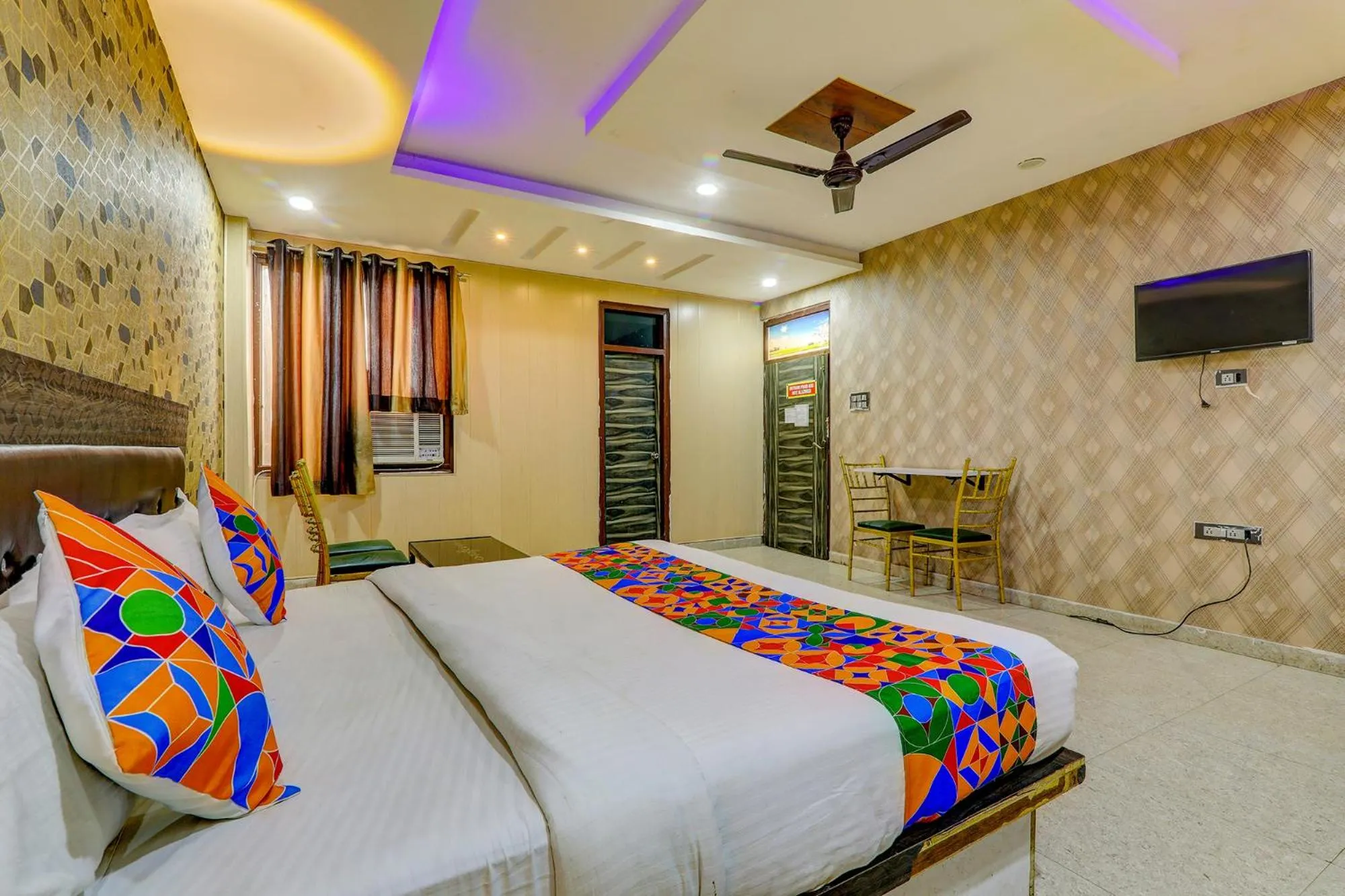 Bed in FabHotel Gold Galaxy