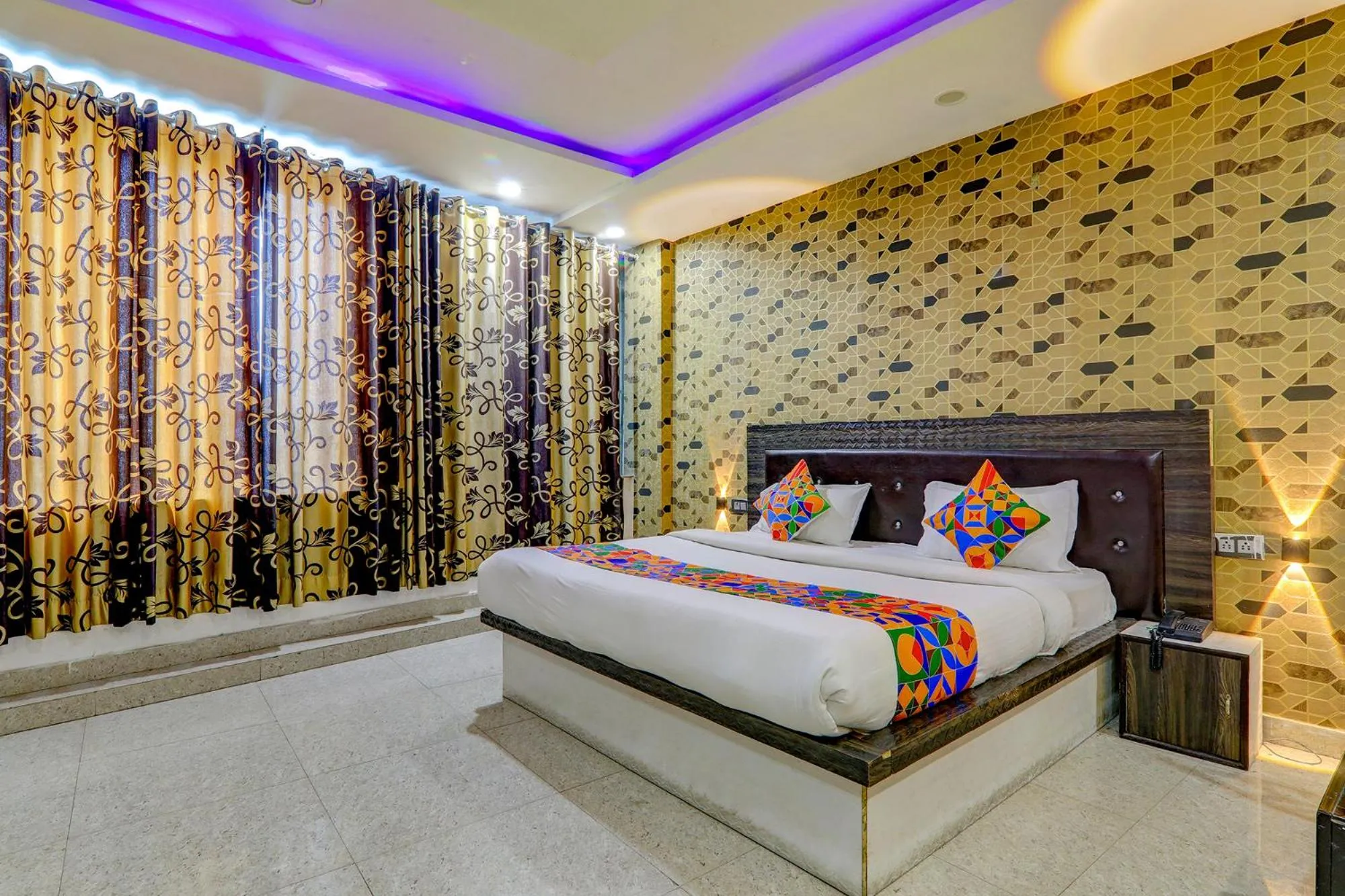 Bed in FabHotel Gold Galaxy