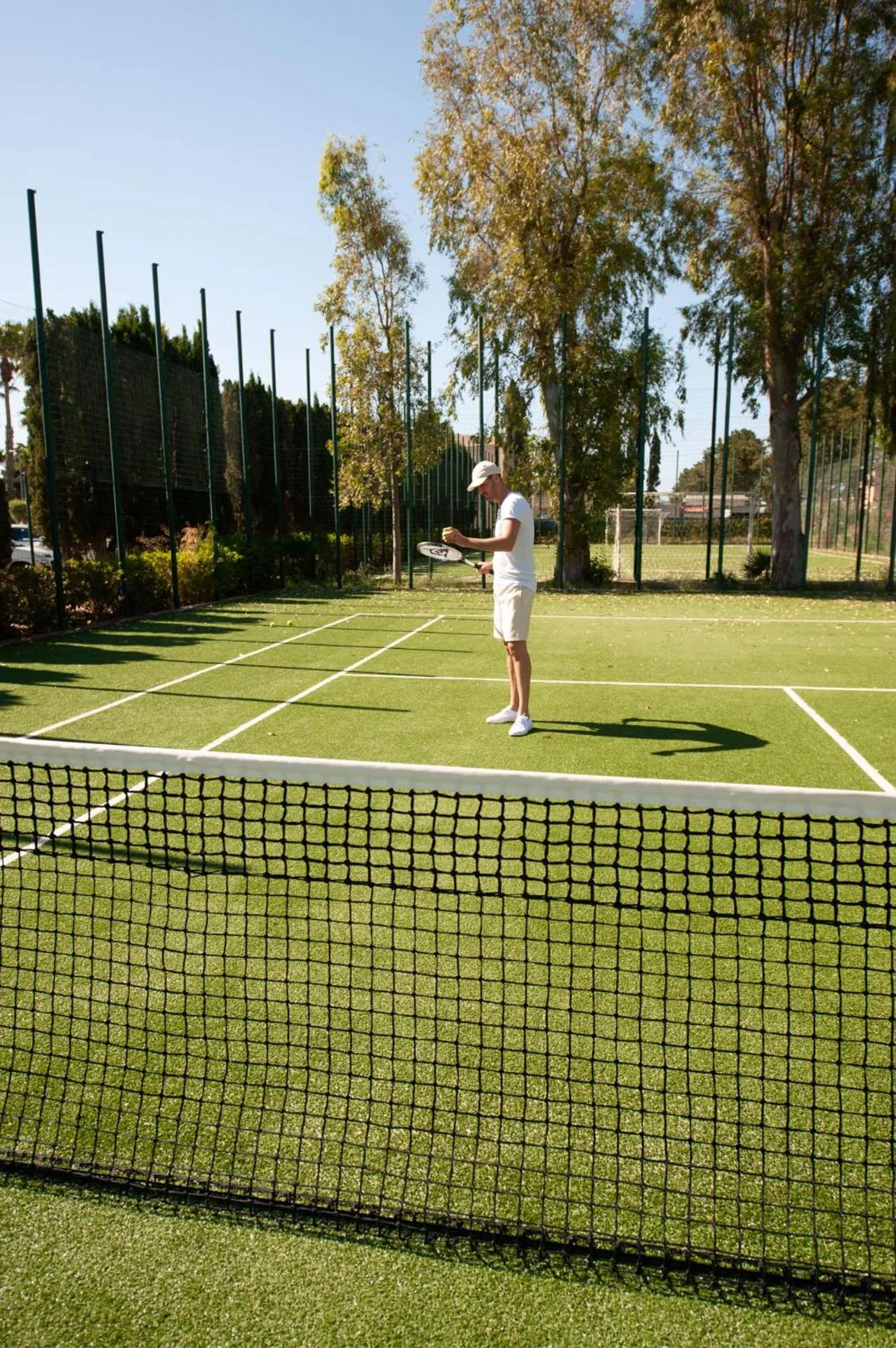 Tennis court in Mangia's Himera Resort