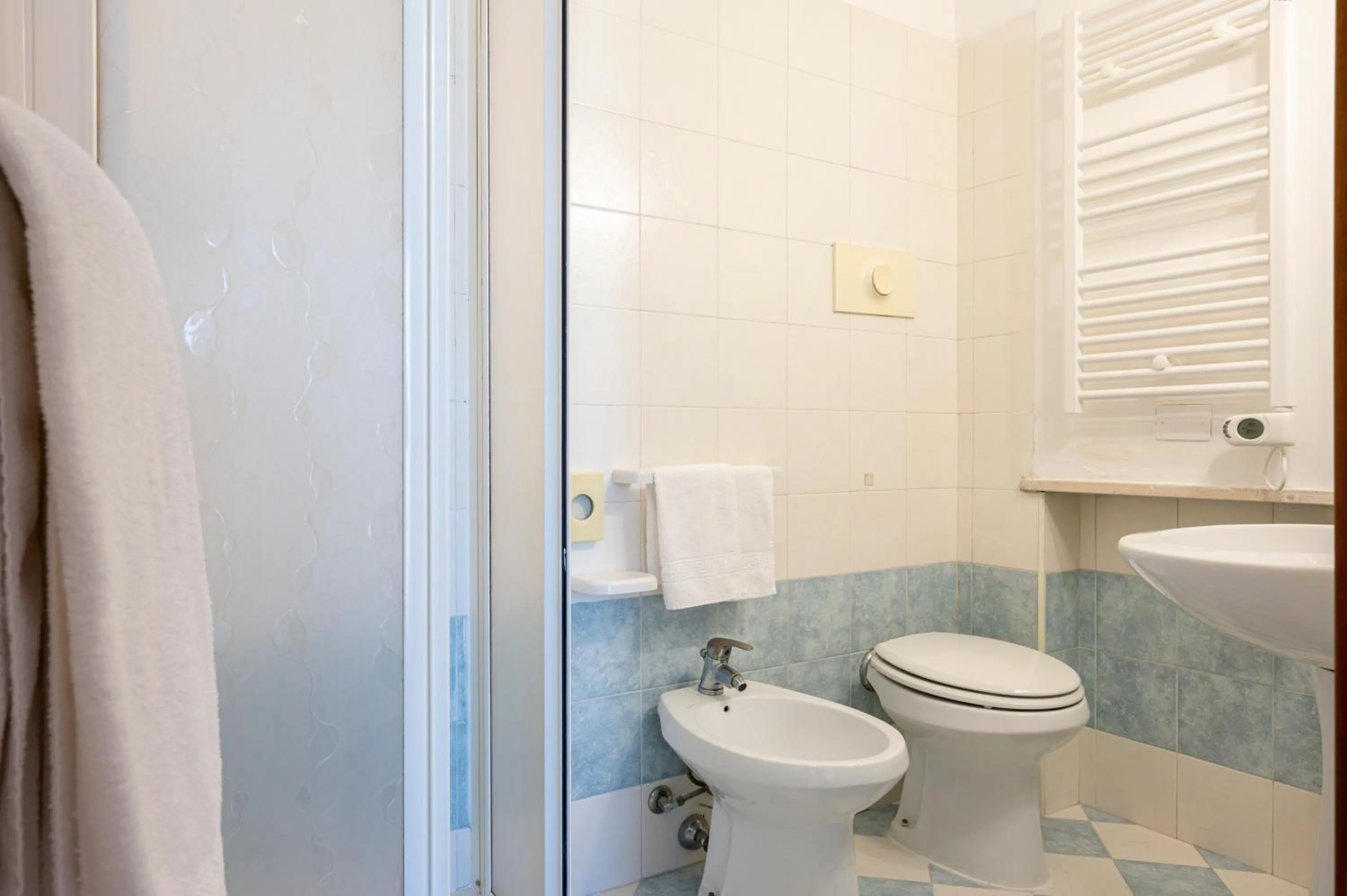 Shower in Amadei Hotel Figaro & Apartments