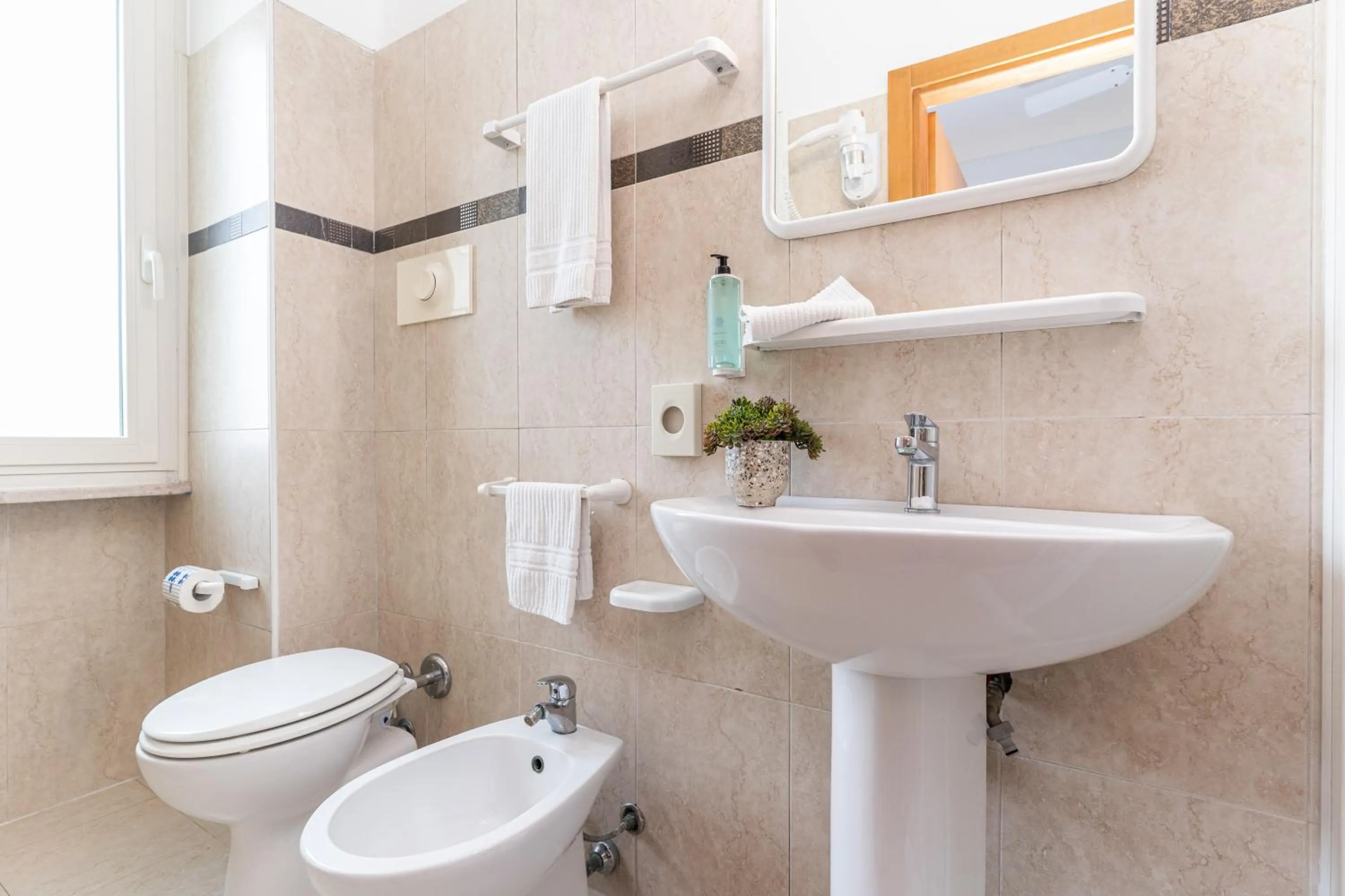 Bathroom in Amadei Hotel Figaro & Apartments