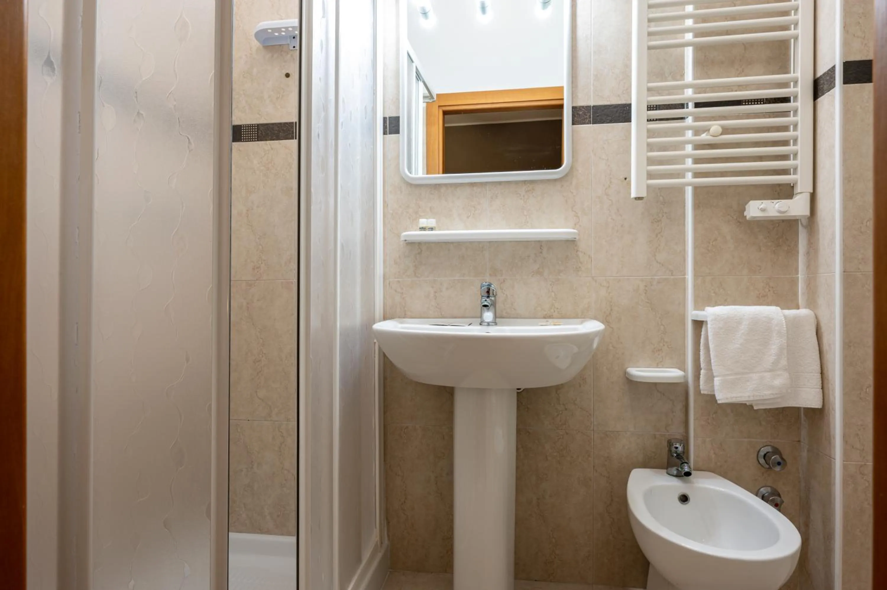 Shower in Amadei Hotel Figaro & Apartments