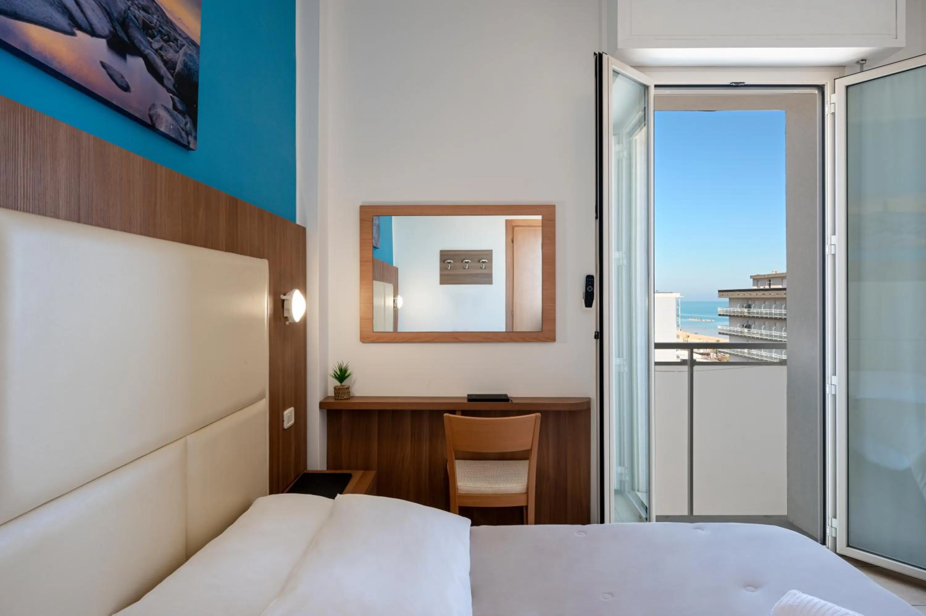 Bed in Amadei Hotel Figaro & Apartments