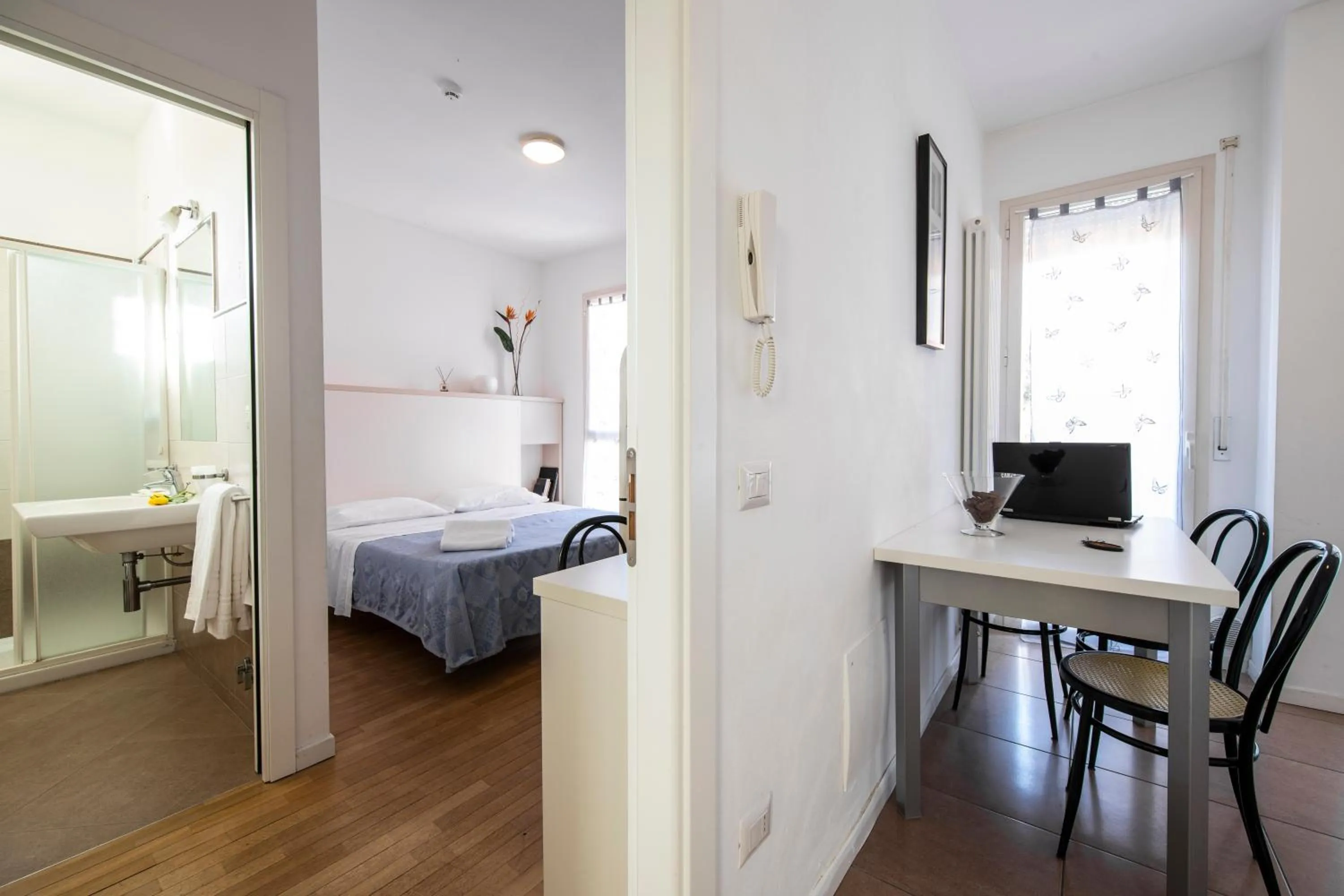 Bed in Amadei Hotel Figaro & Apartments