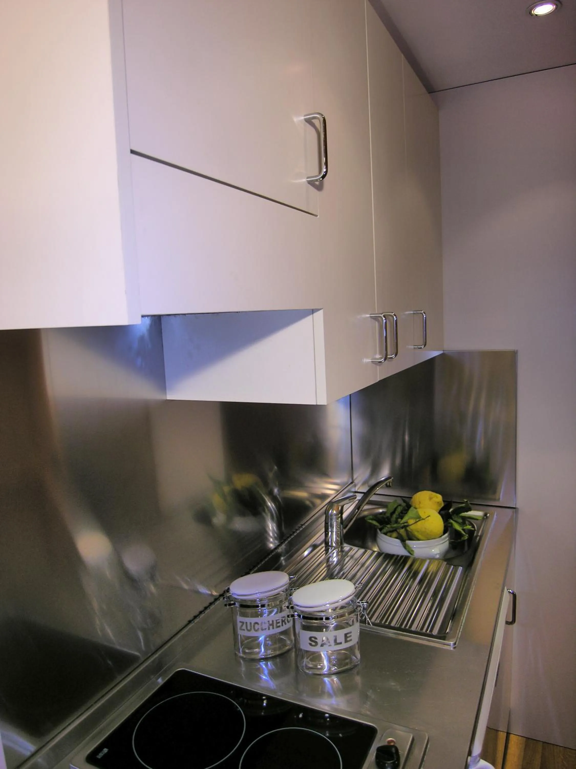 Kitchen or kitchenette in Residence Borgonuovo Uno Apartments