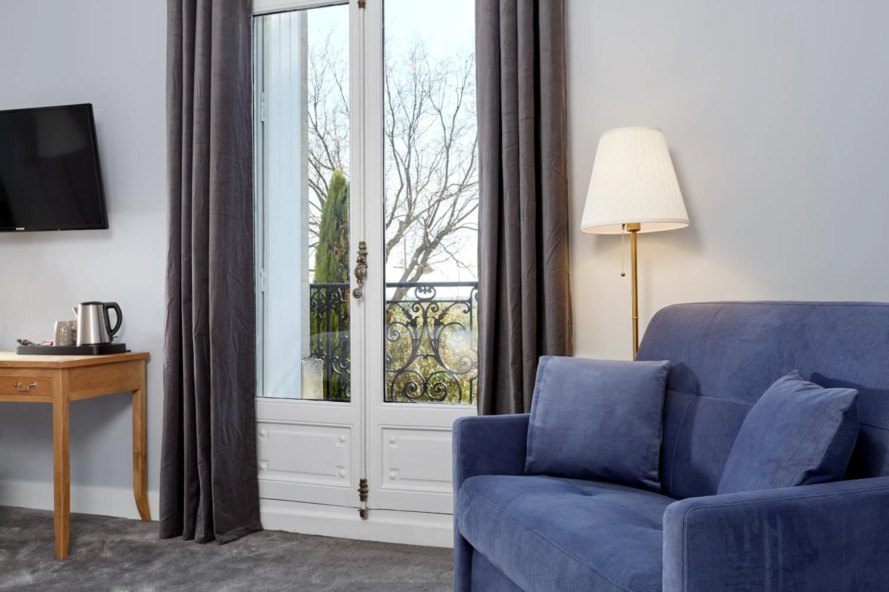 Bedroom in Hôtel Saint-Alban