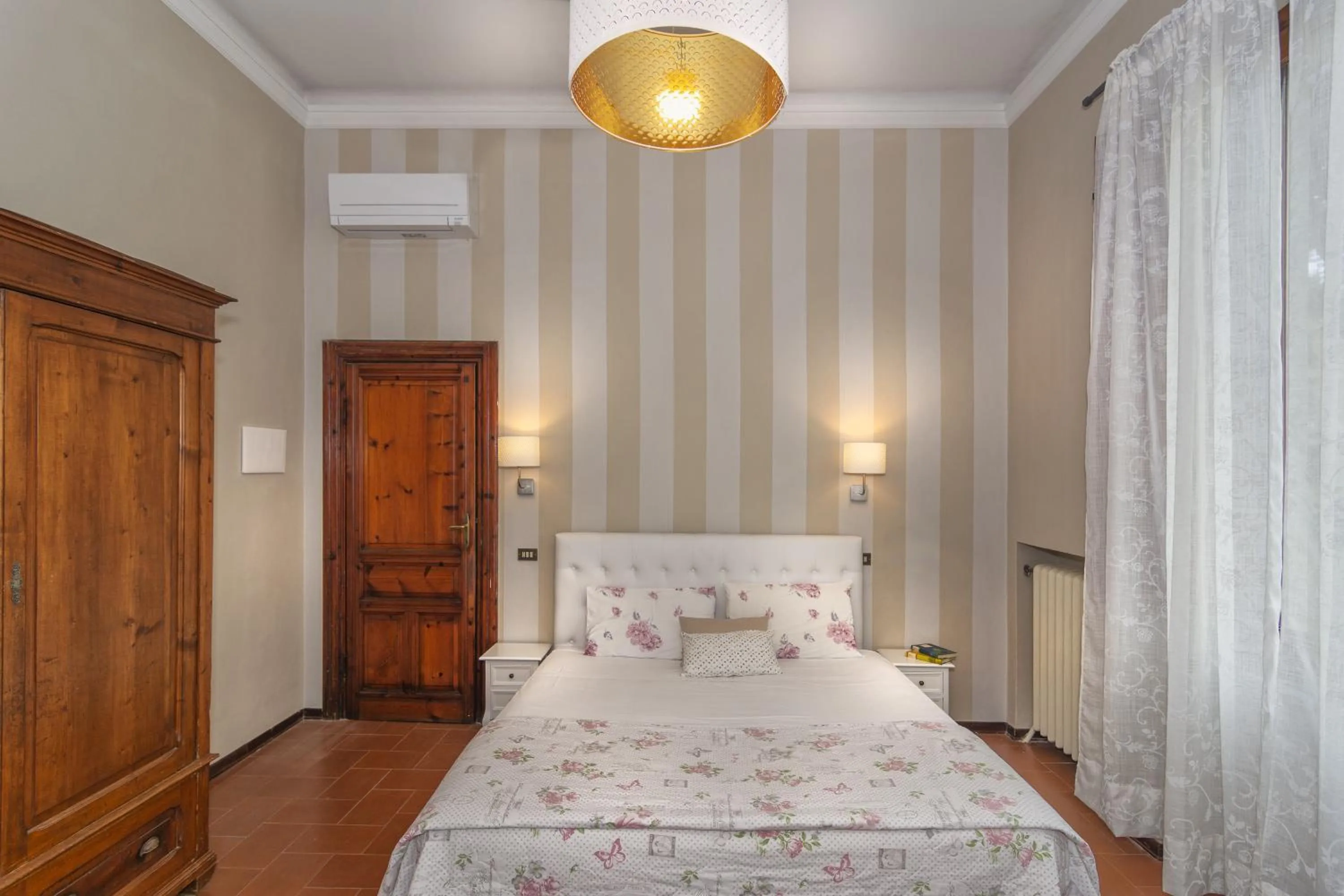 Bed in Villa Ricci Suites