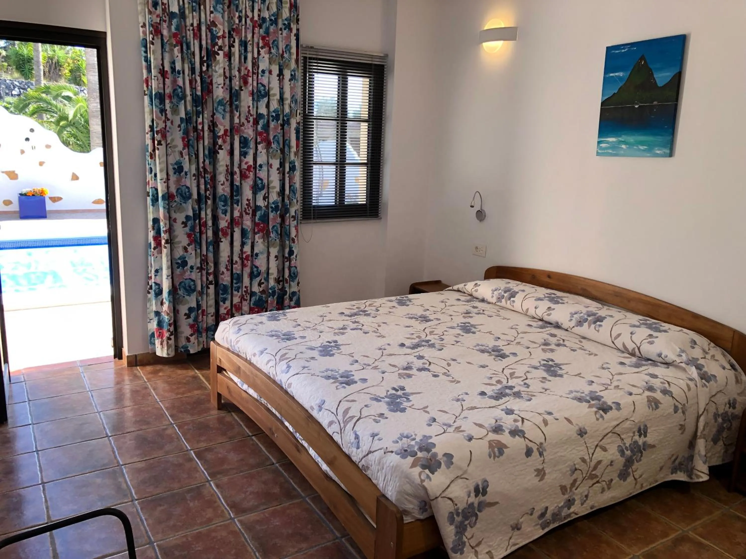 Bed in CASANTILVIA heated pool paradise