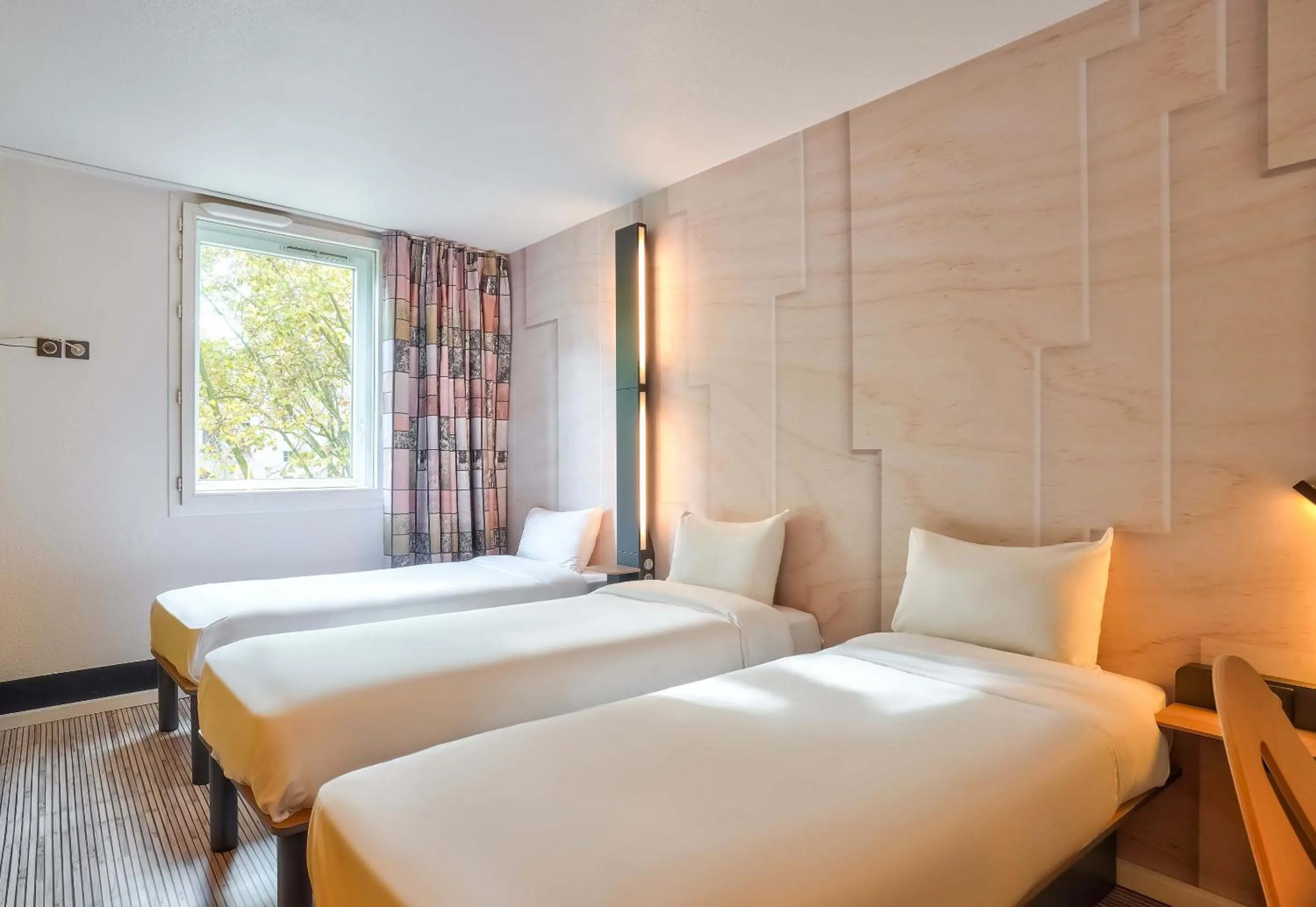 Photo of the whole room, Bed in B&B HOTEL Paris Malakoff Parc des Expositions