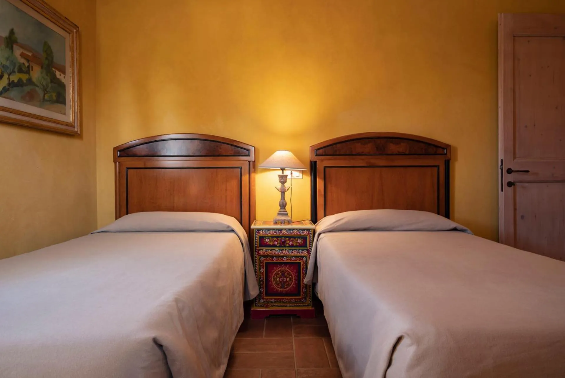 Bed in Guadalupe Tuscany Resort