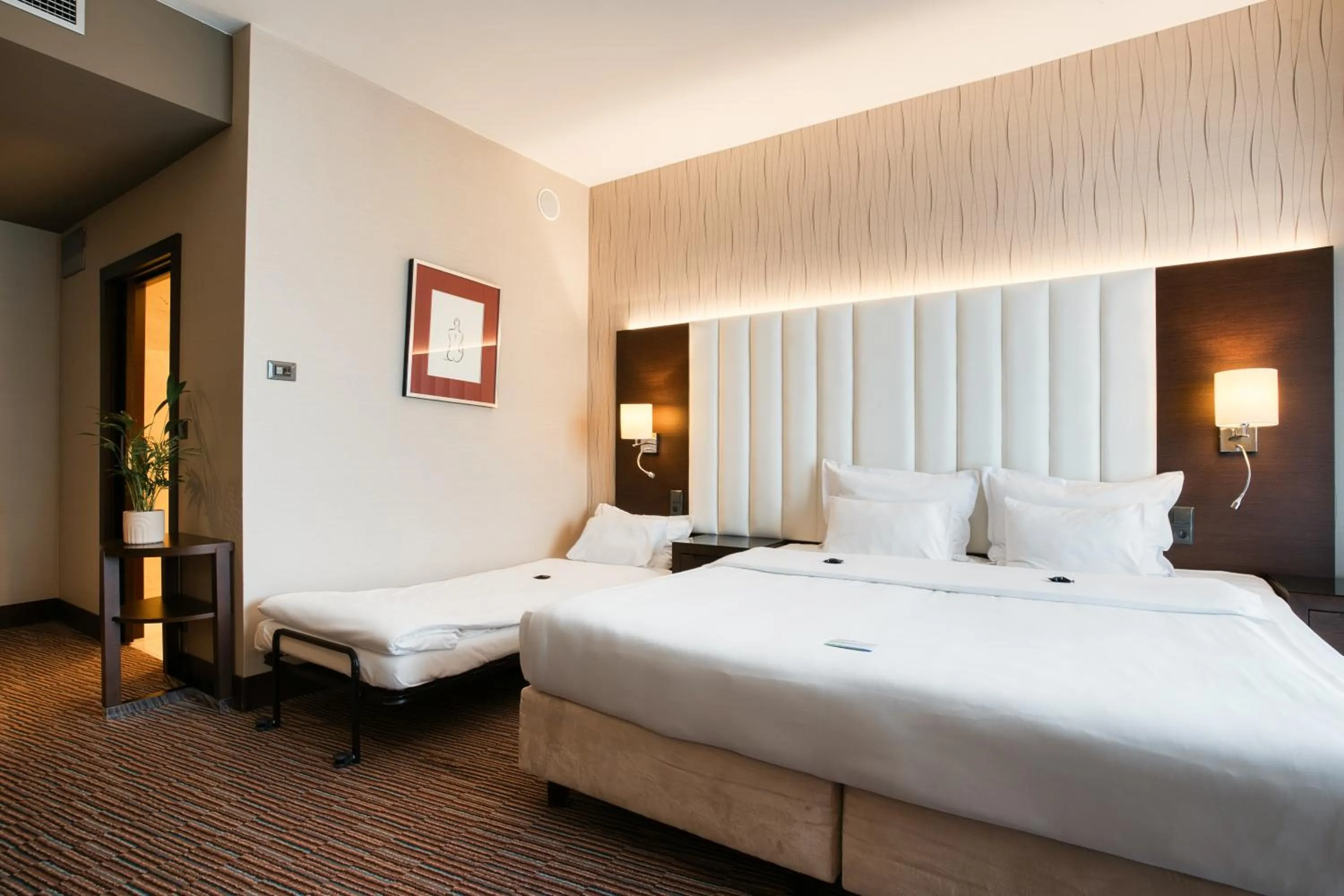 Bed in Copernicus Toruń Hotel