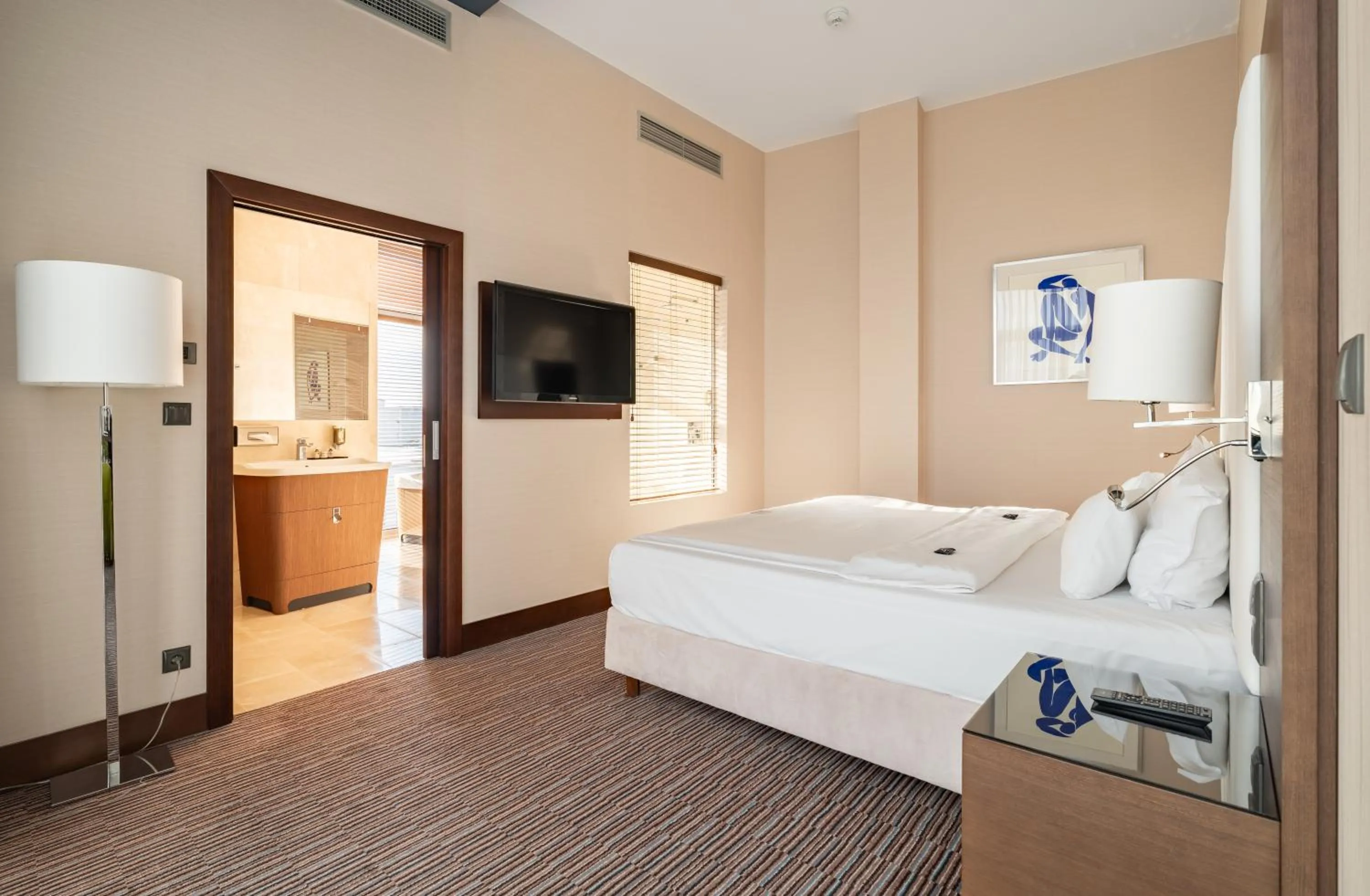 Bed in Copernicus Toruń Hotel