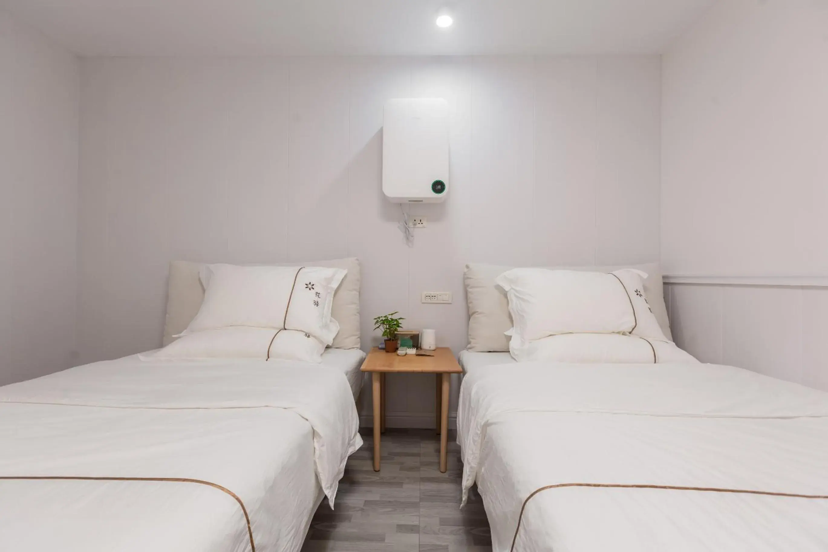 Bed in Guilin Flowers Inn Bed in Guilin Flowers Inn