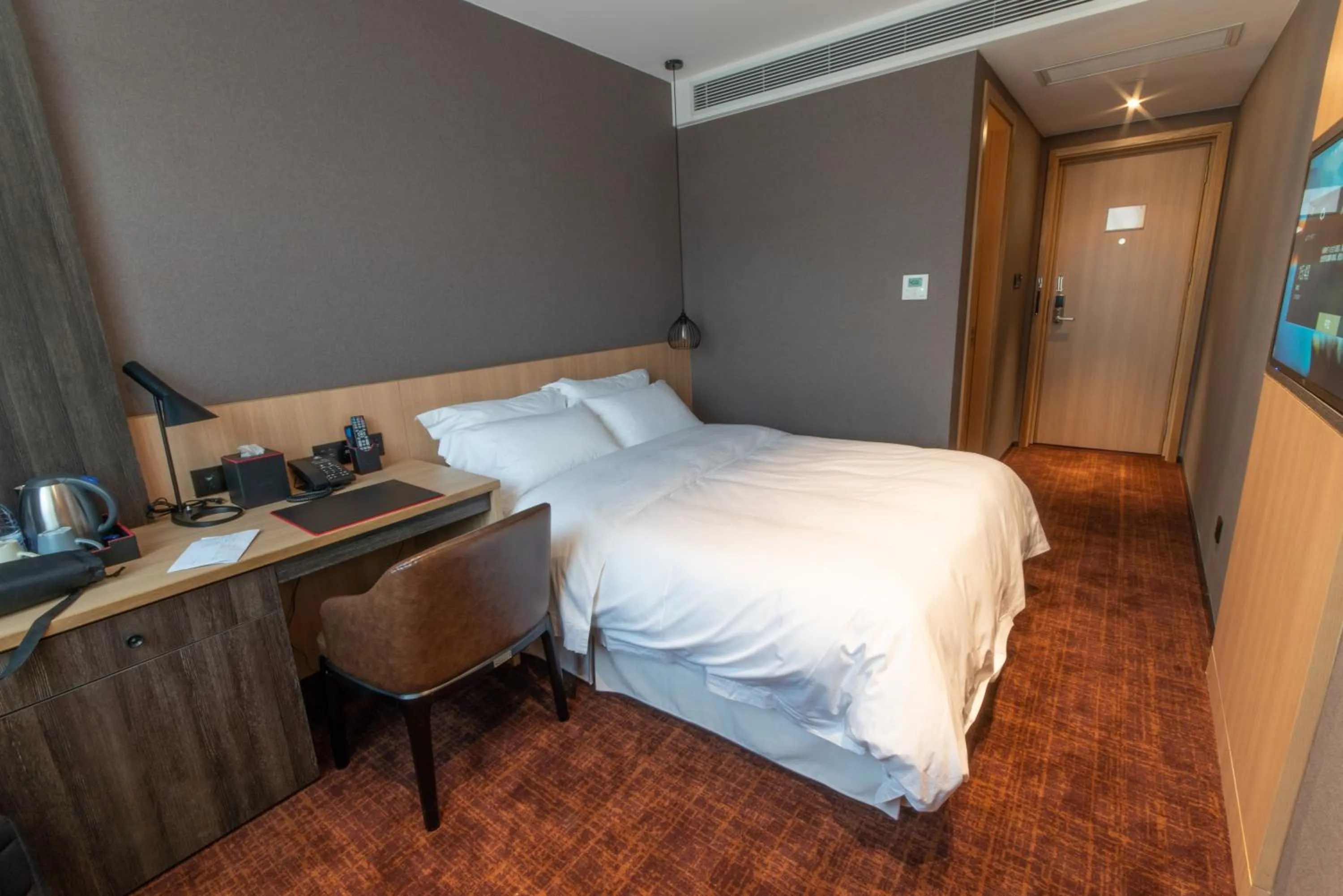 Bed in Hotel Coka Chuansha Metro - Shanghai PVG Airport