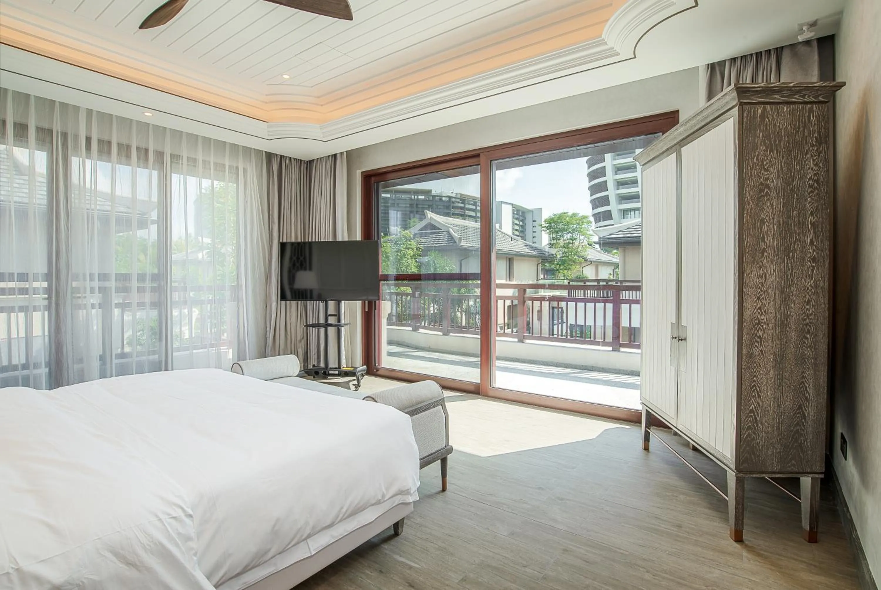 Bed in HaitangBay Loosen Coast Resort Villas