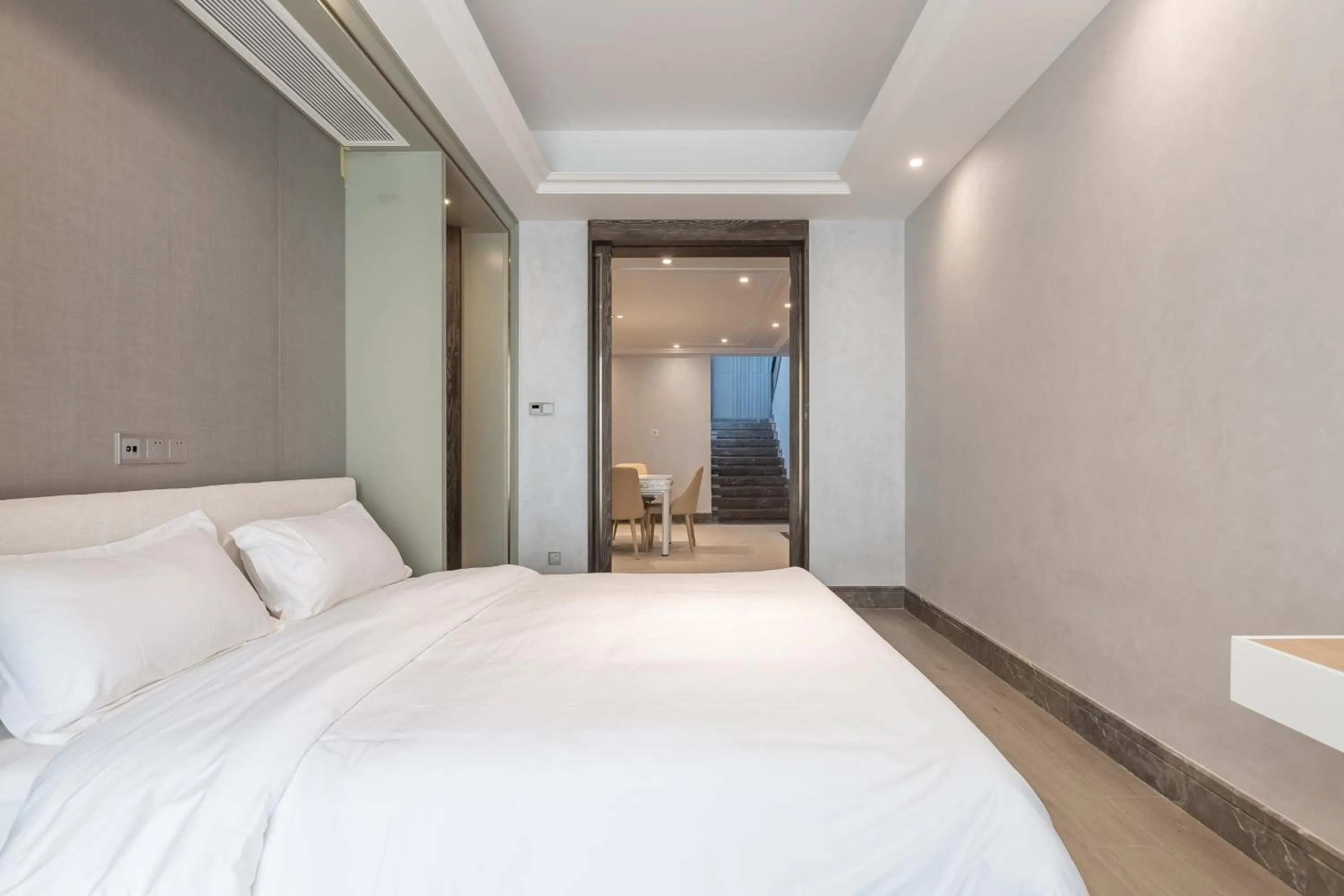 Bed in HaitangBay Loosen Coast Resort Villas