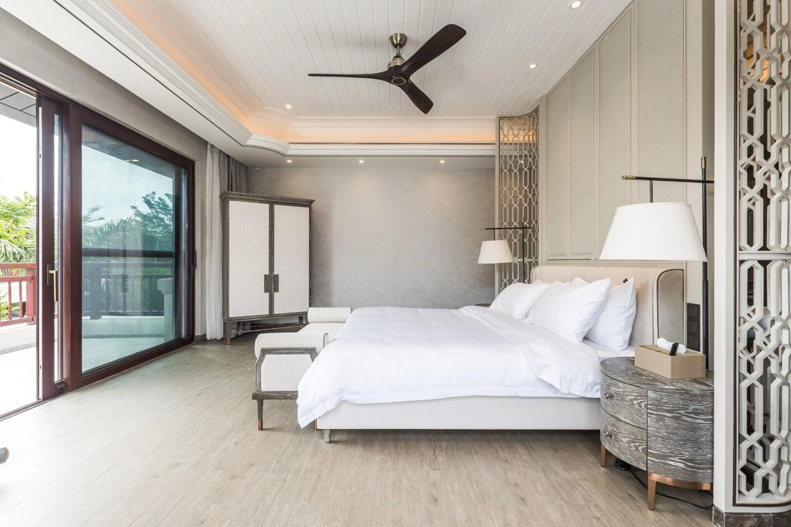 Bed in HaitangBay Loosen Coast Resort Villas