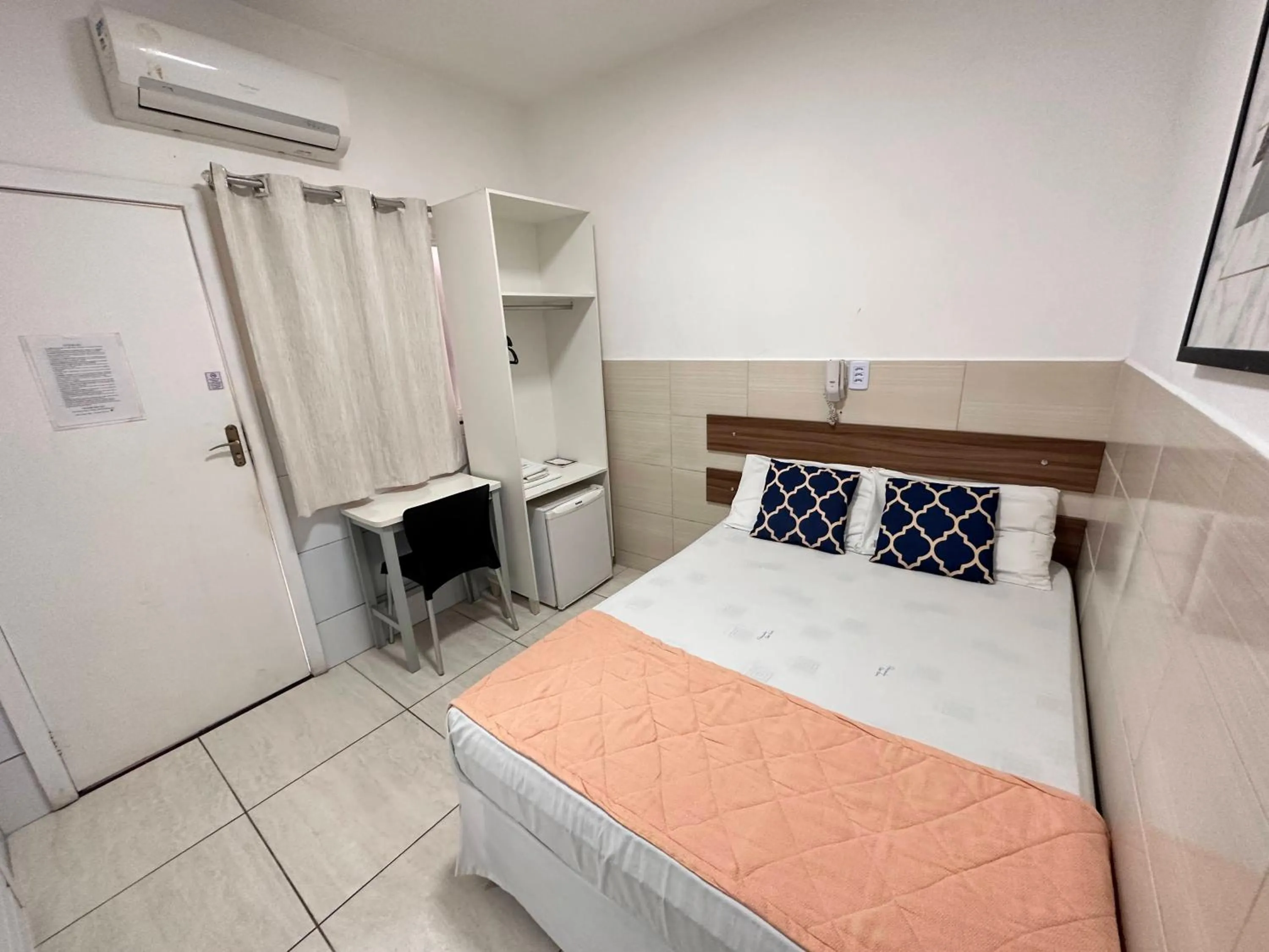 Bed in Pousada São Luiz