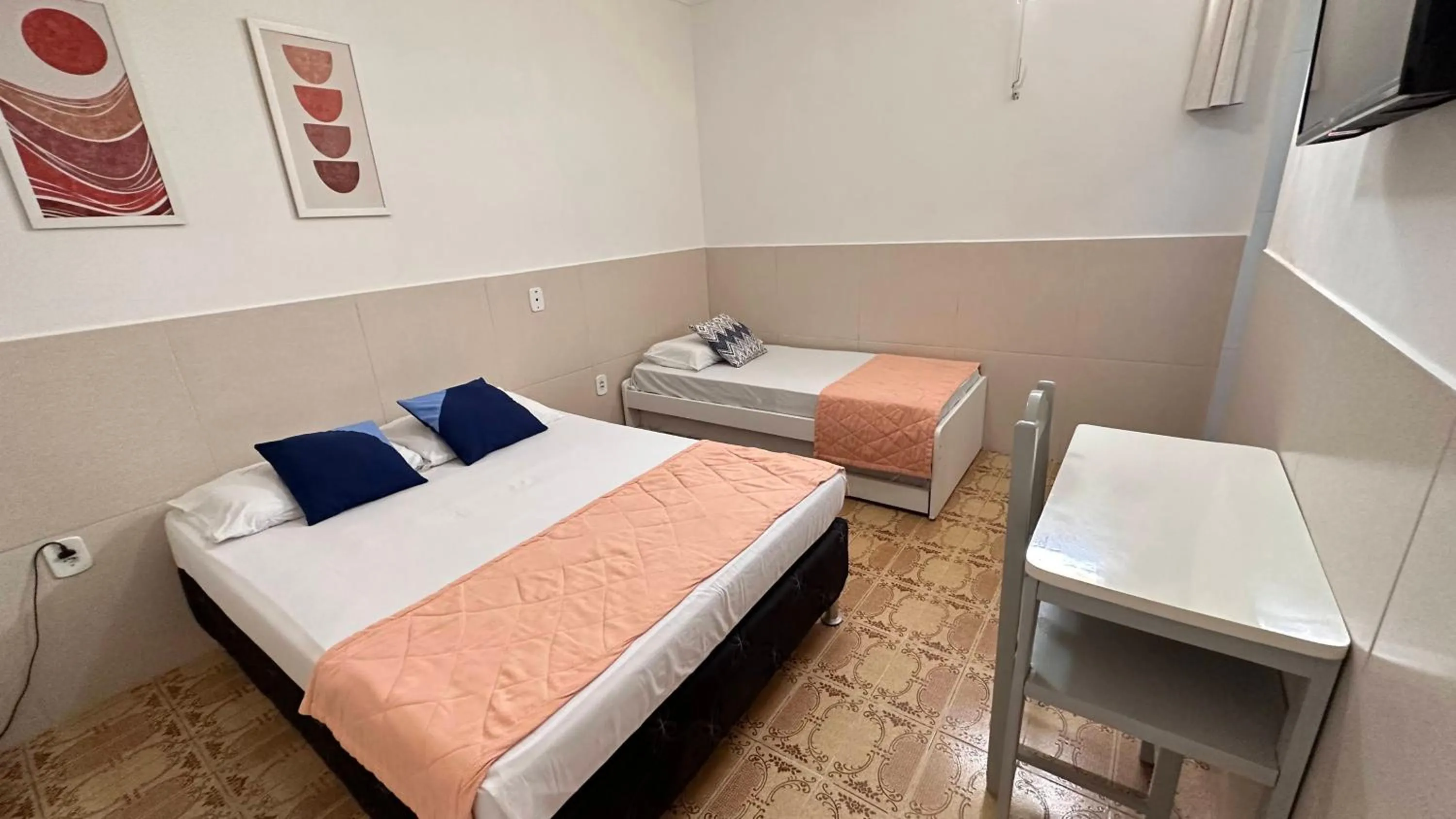 Bed in Pousada São Luiz